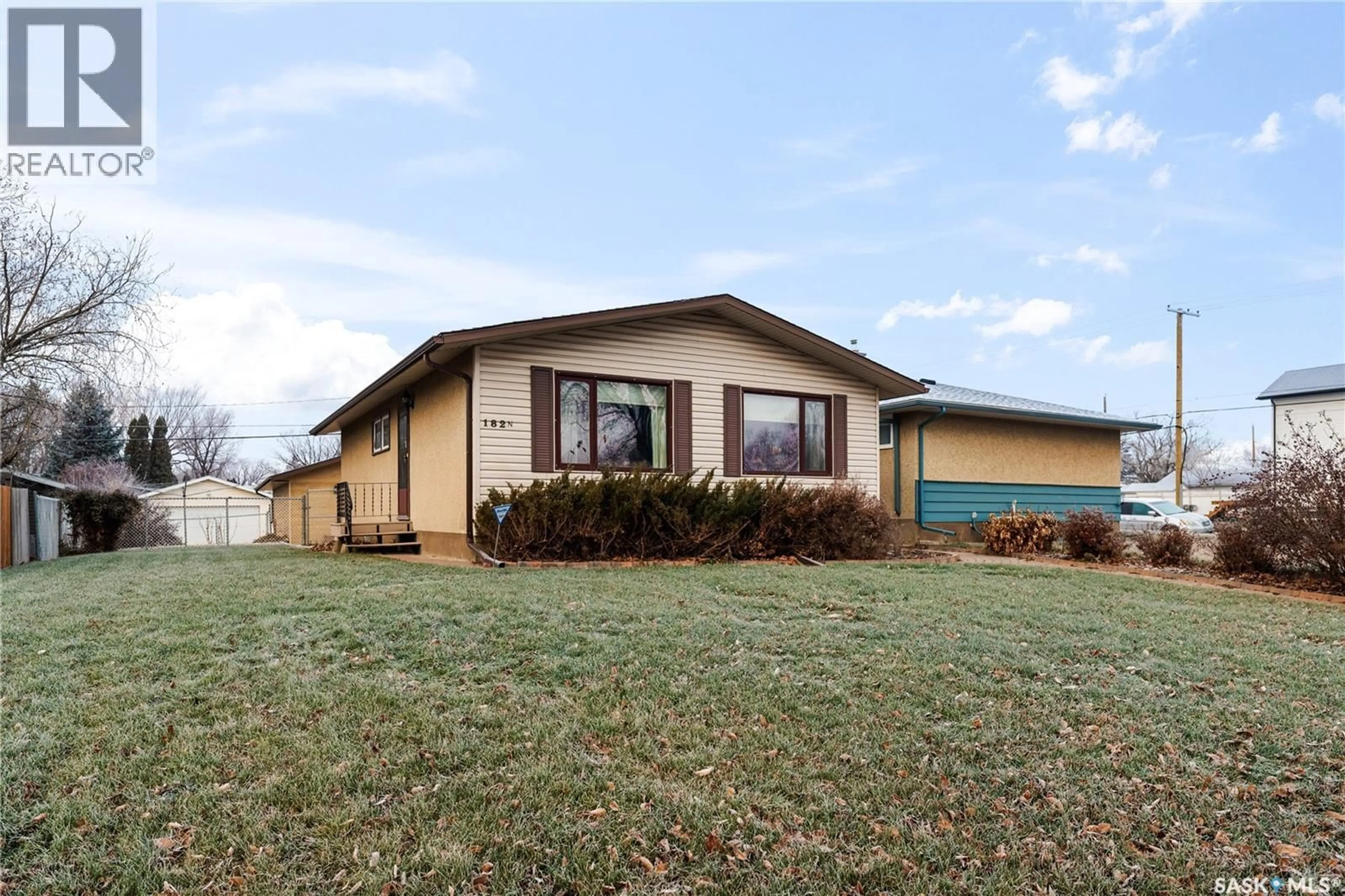 Home with vinyl exterior material, street for 182 SCARTH STREET, Regina Saskatchewan S4R2Z3