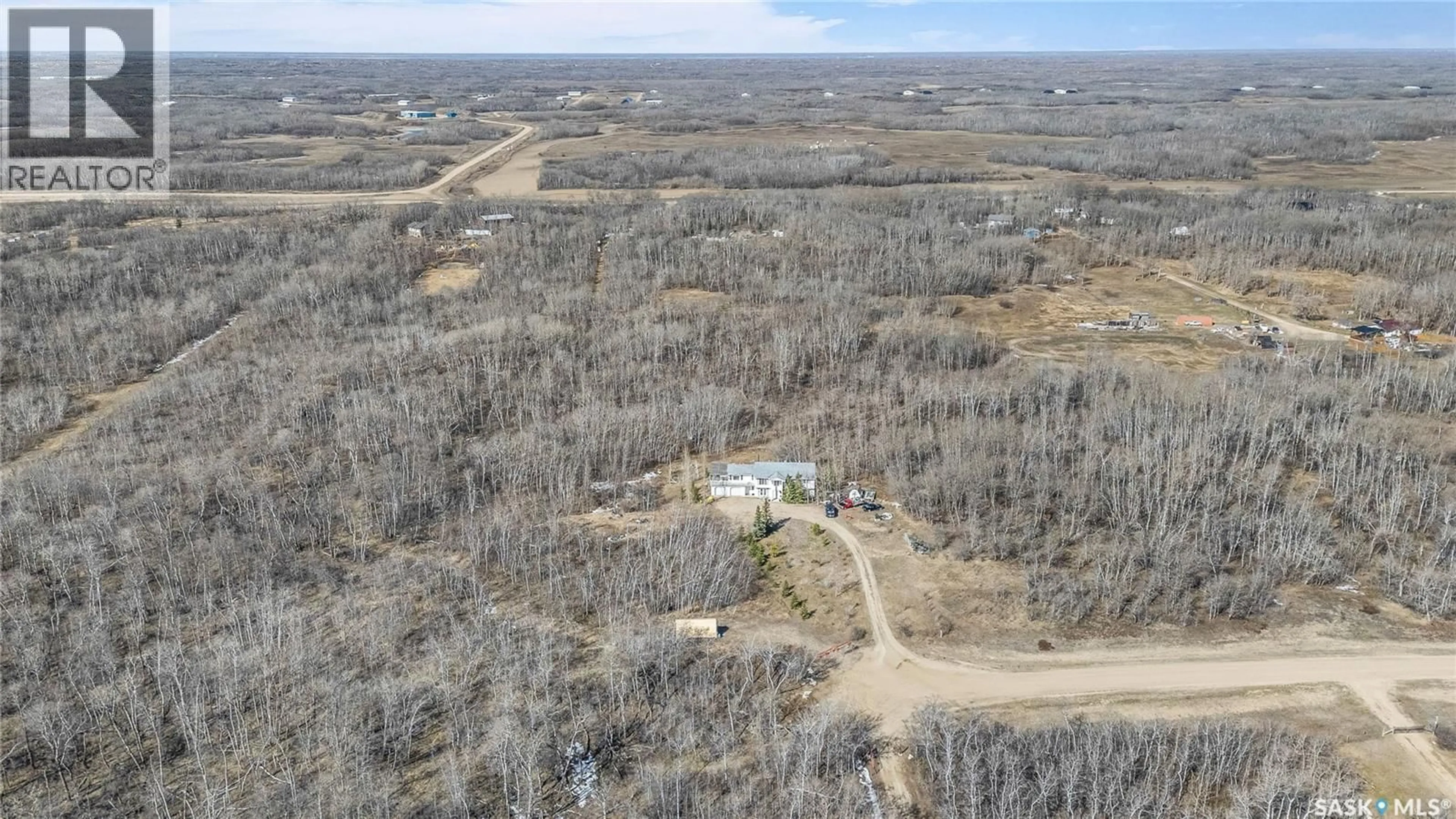 A pic from outside/outdoor area/front of a property/back of a property/a pic from drone, forest/trees view for 6 MERCIER PLACE, Dundurn Rm No. 314 Saskatchewan S7C0C9
