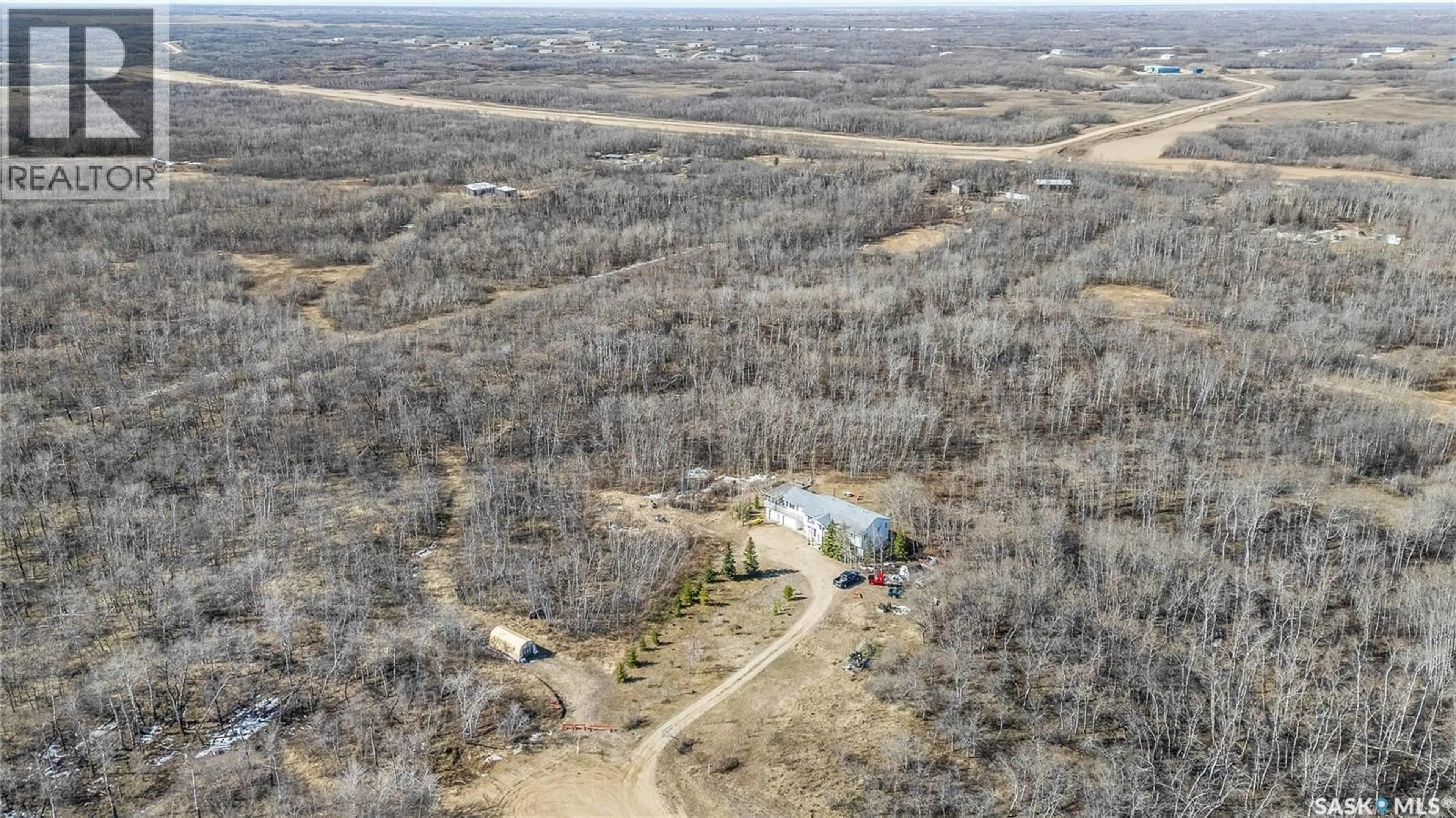 A pic from outside/outdoor area/front of a property/back of a property/a pic from drone, forest/trees view for 6 MERCIER PLACE, Dundurn Rm No. 314 Saskatchewan S7C0C9
