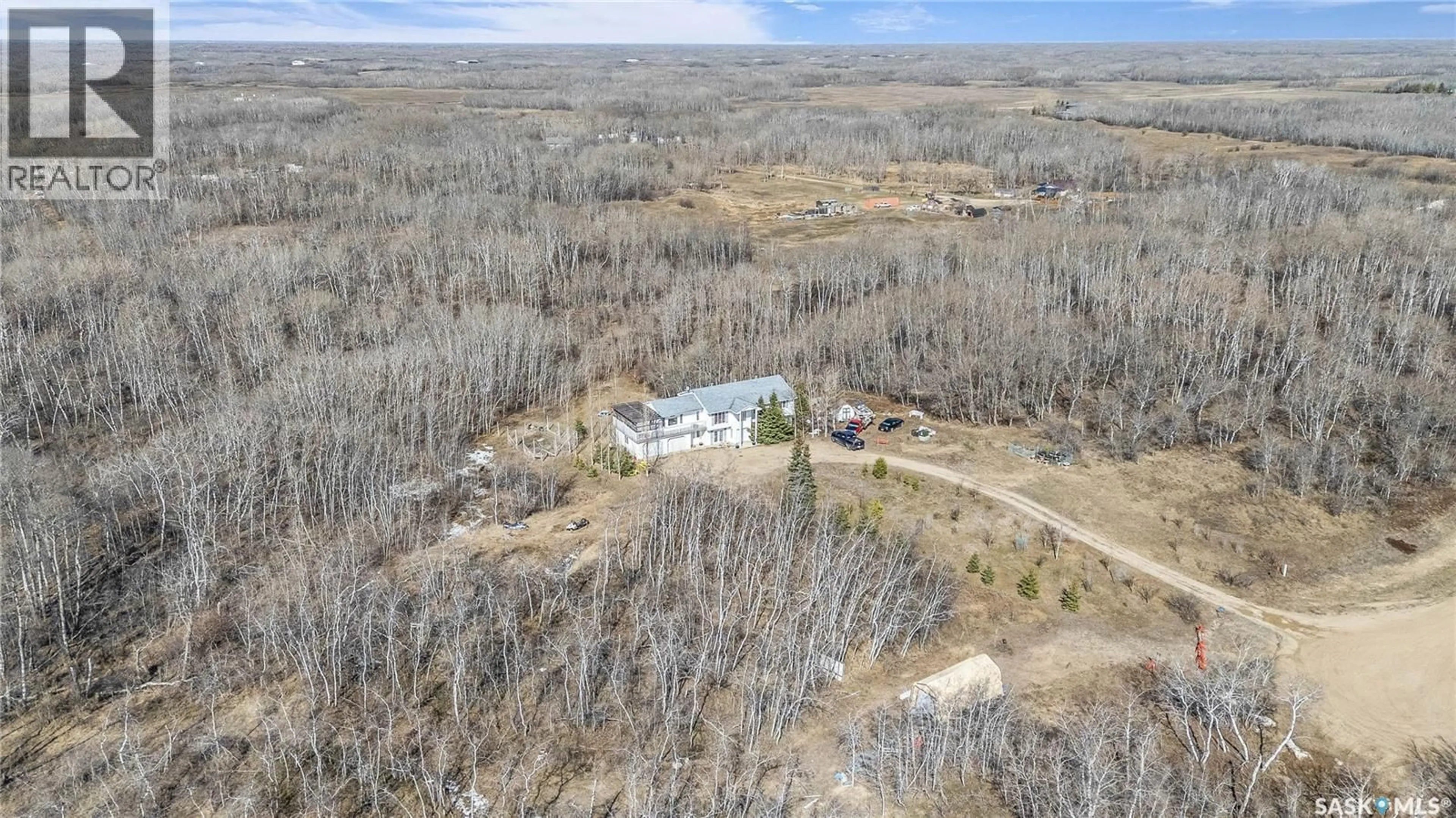 A pic from outside/outdoor area/front of a property/back of a property/a pic from drone, forest/trees view for 6 MERCIER PLACE, Dundurn Rm No. 314 Saskatchewan S7C0C9
