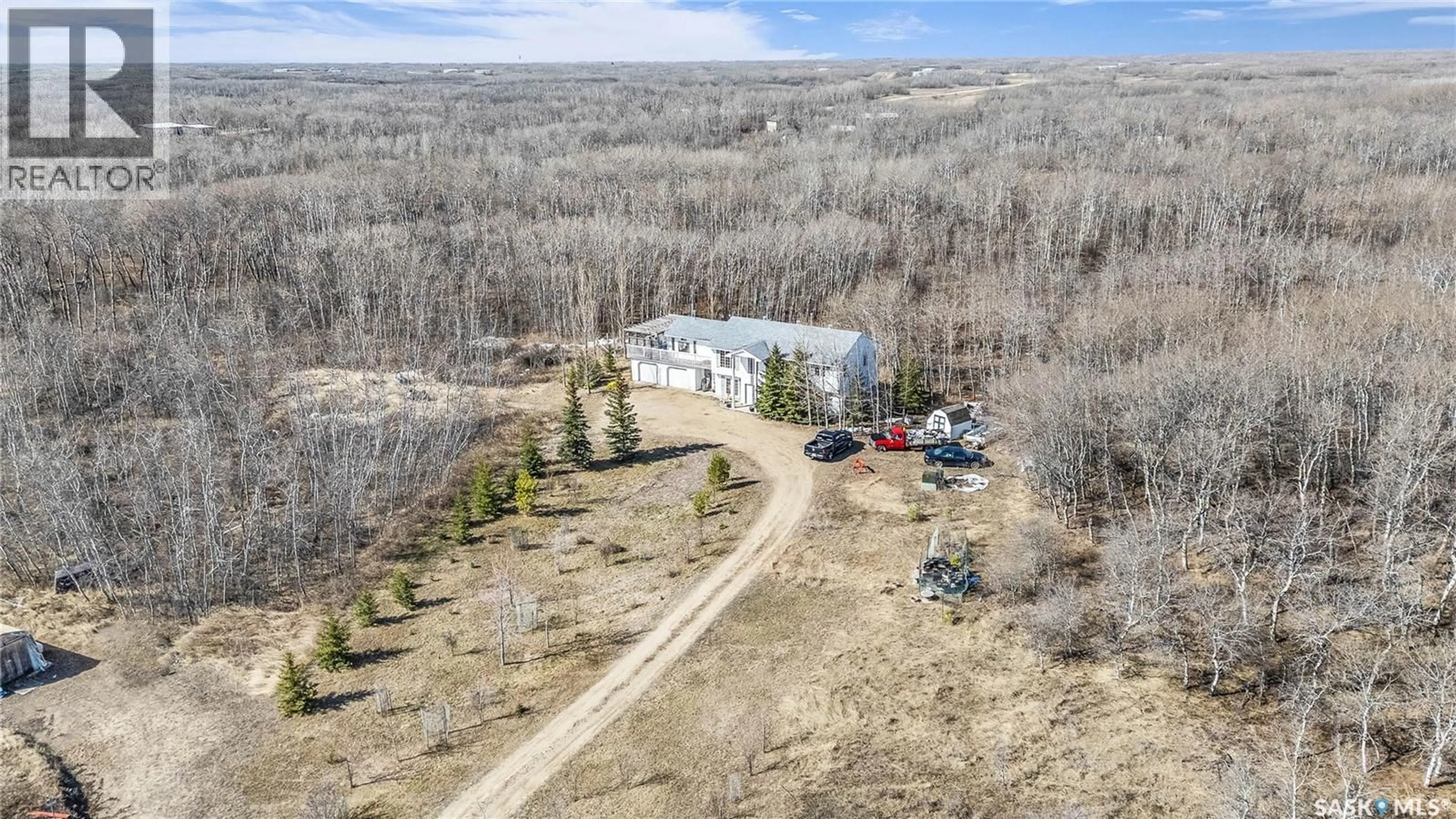 A pic from outside/outdoor area/front of a property/back of a property/a pic from drone, forest/trees view for 6 MERCIER PLACE, Dundurn Rm No. 314 Saskatchewan S7C0C9