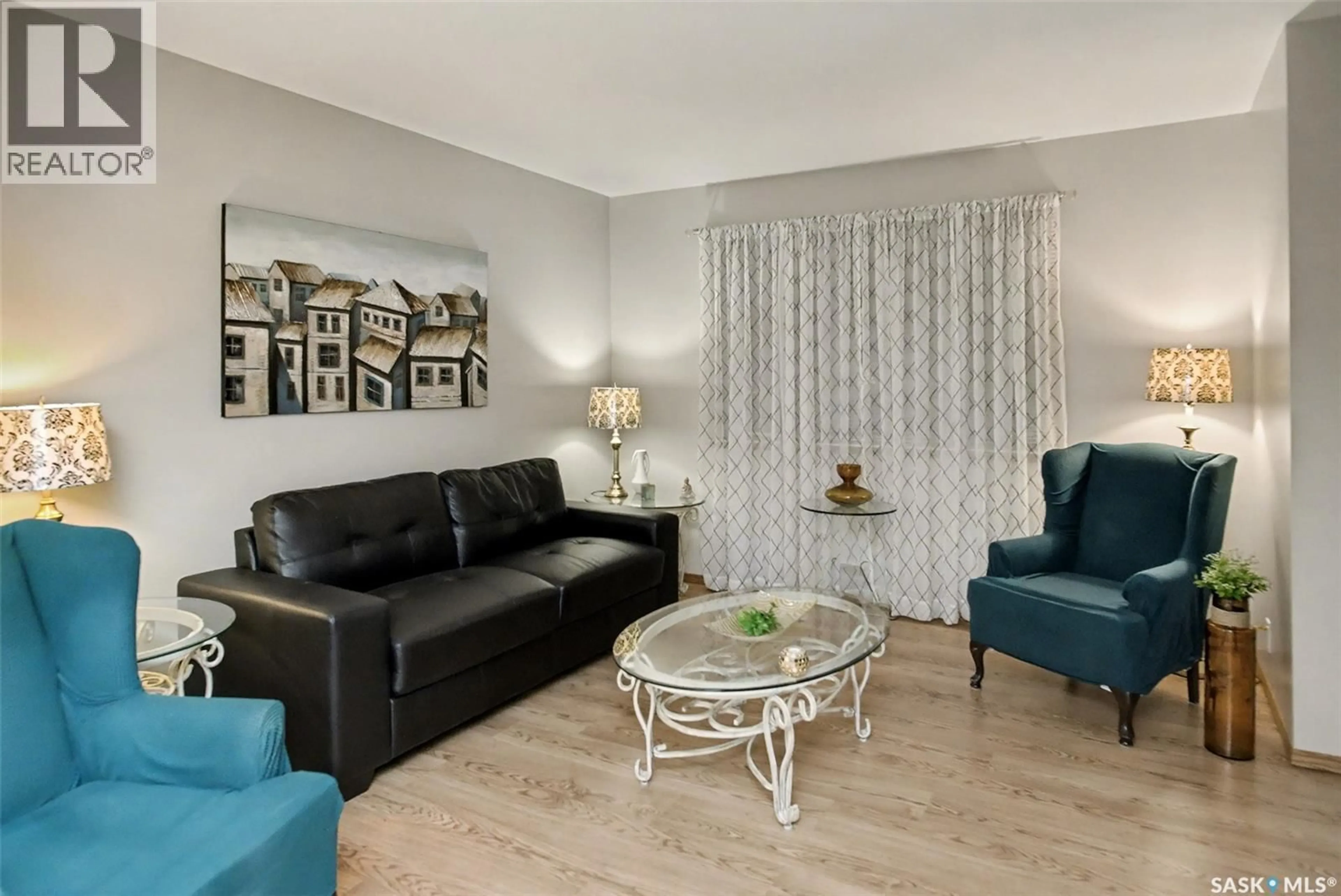 Living room with furniture, wood/laminate floor for 426 ROYAL STREET, Regina Saskatchewan S4R4Y6