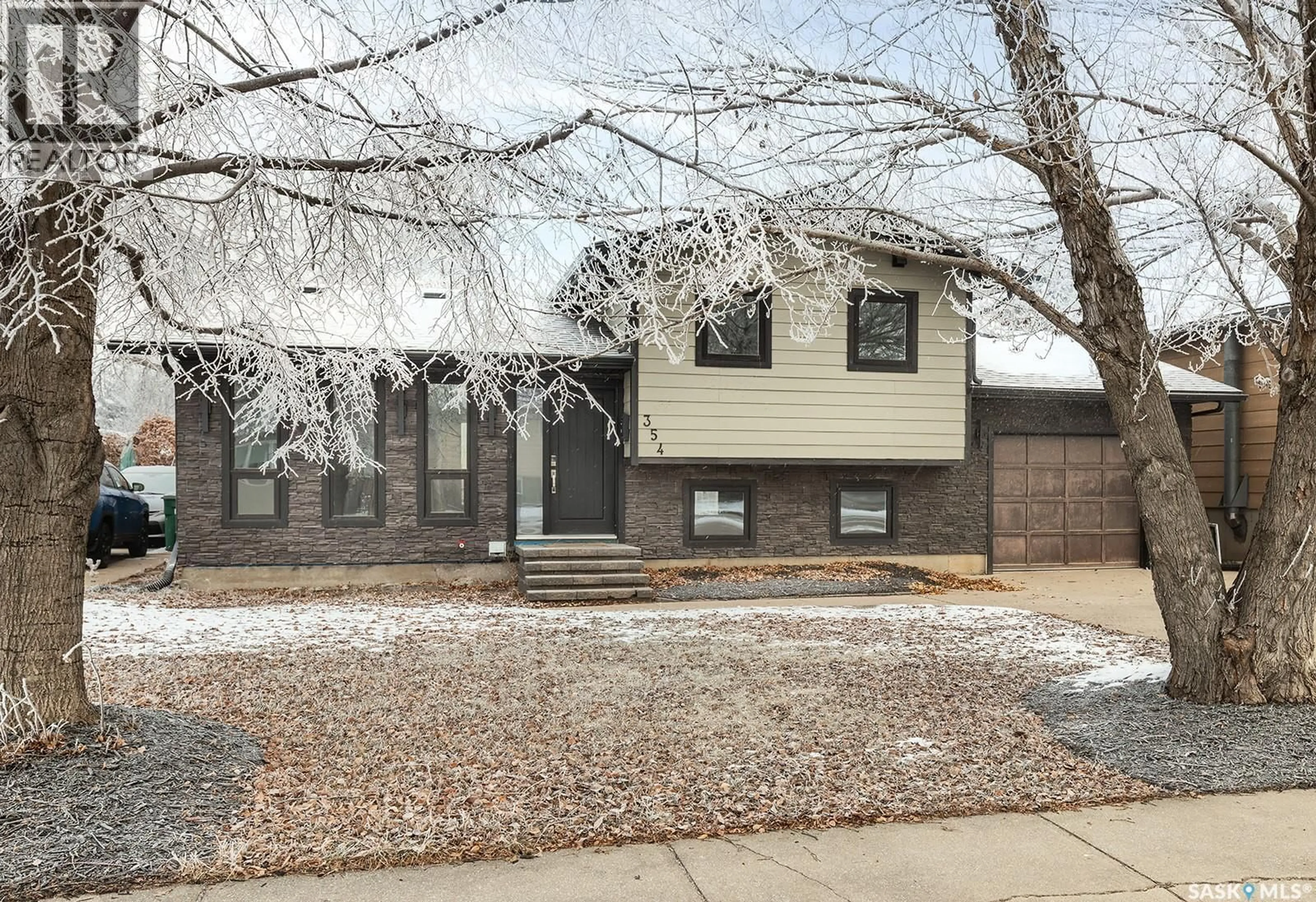 Home with vinyl exterior material, street for 354 ALLEGRETTO CRESCENT, Saskatoon Saskatchewan S7K6R5