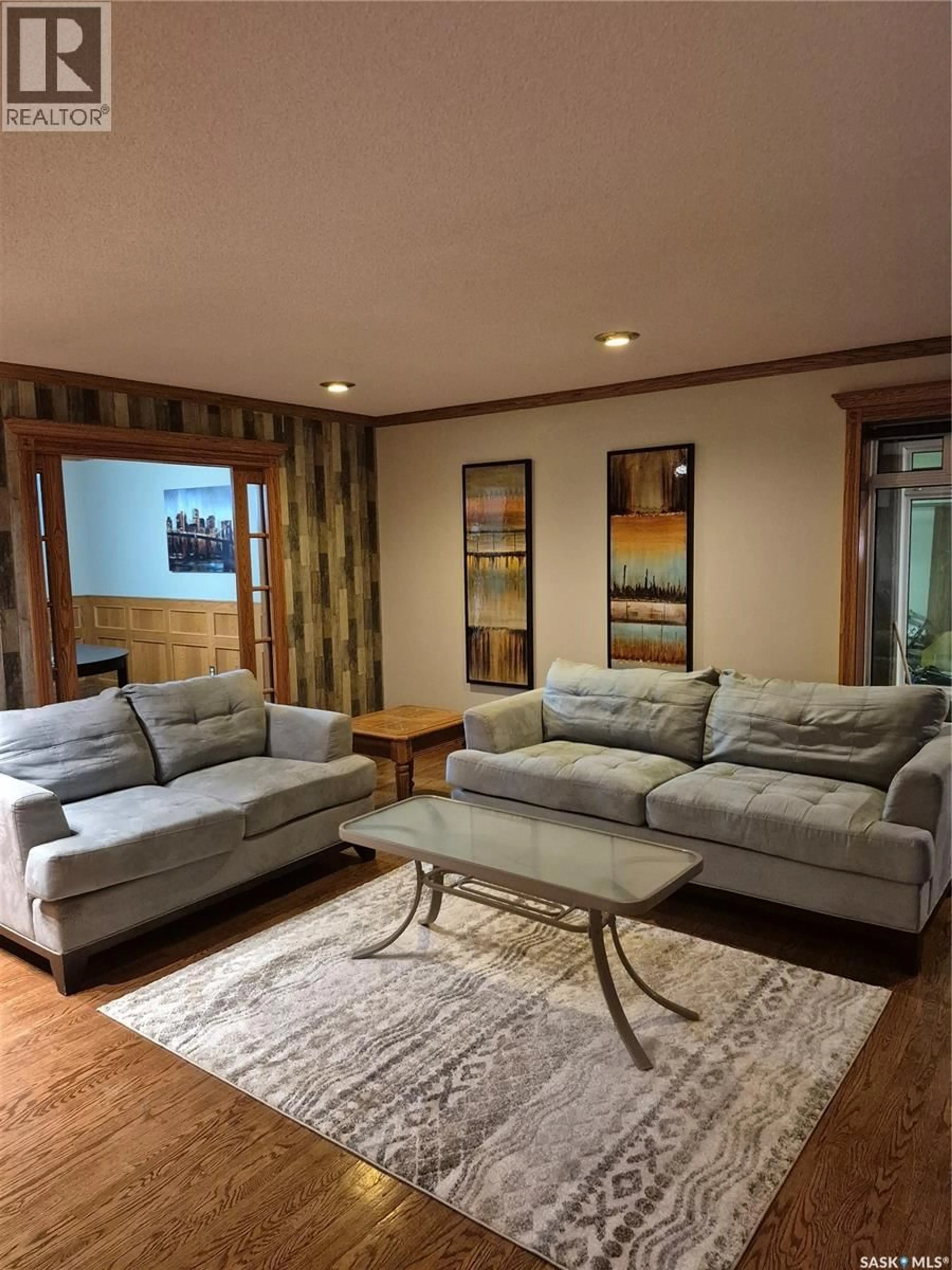 Living room with furniture, unknown for 1809 THIRD STREET, Estevan Saskatchewan S4A0T1