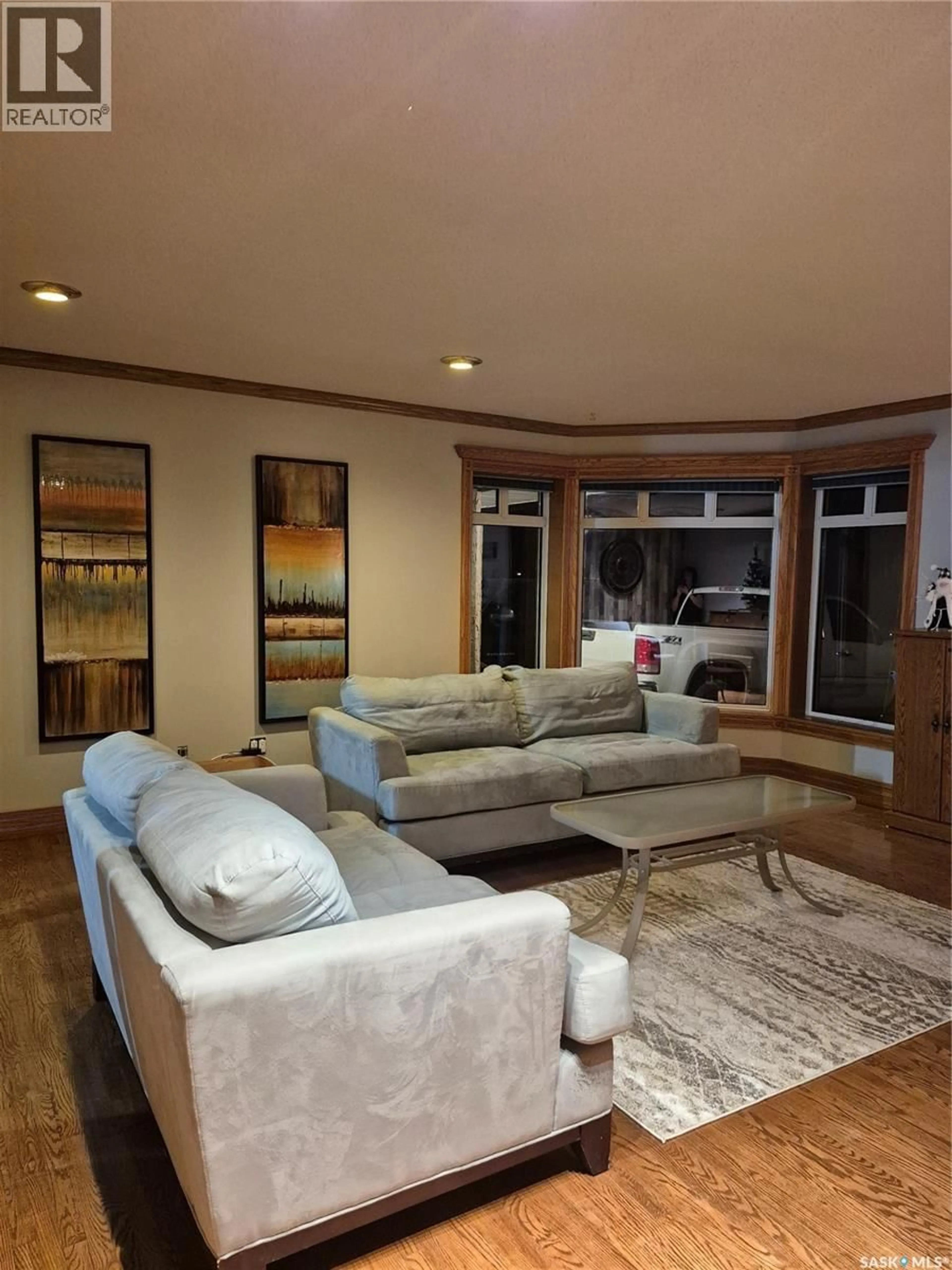 Living room with furniture, unknown for 1809 THIRD STREET, Estevan Saskatchewan S4A0T1