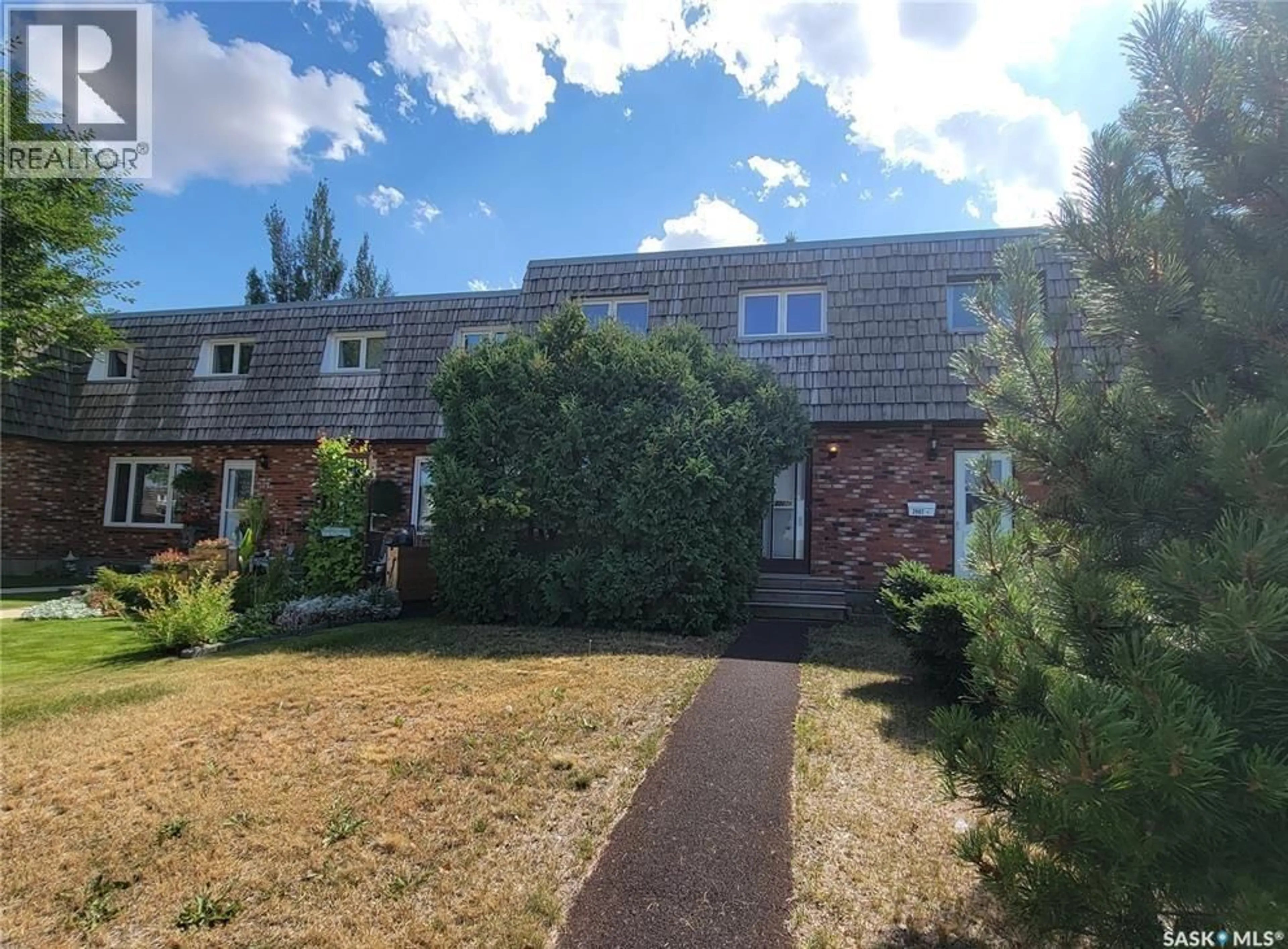 A pic from outside/outdoor area/front of a property/back of a property/a pic from drone, street for B - 2002 FOLEY DRIVE, North Battleford Saskatchewan S9A3G9