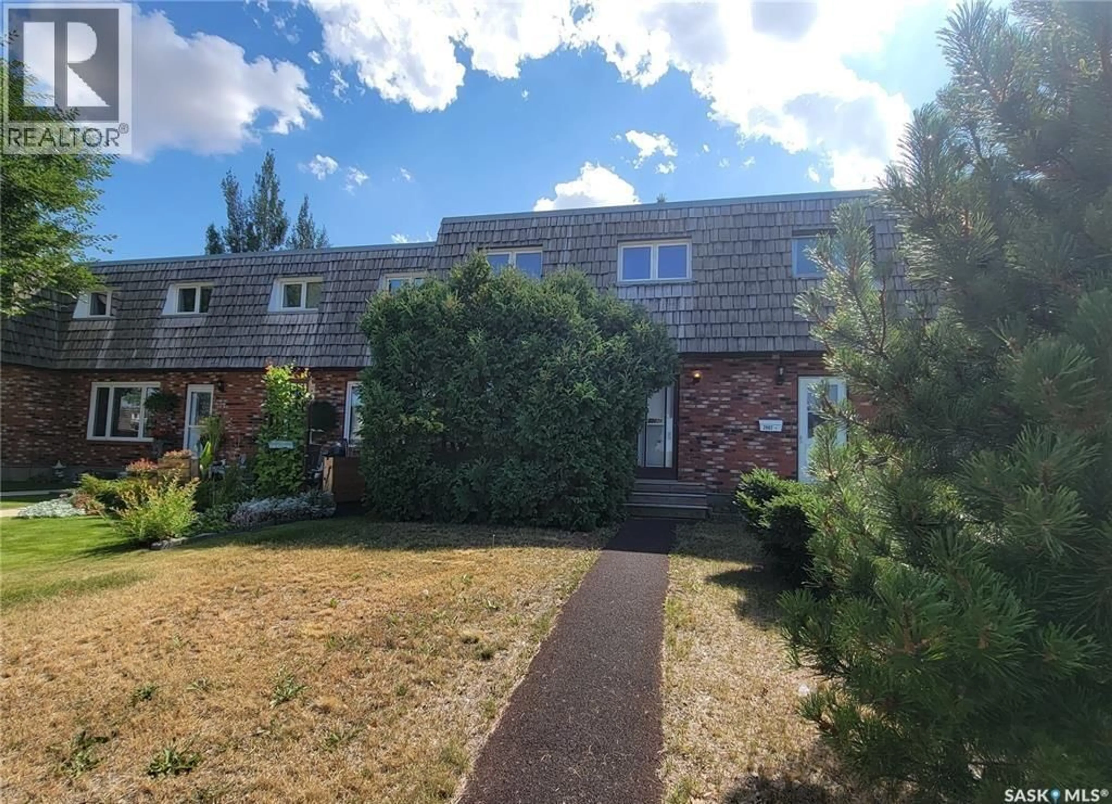 A pic from outside/outdoor area/front of a property/back of a property/a pic from drone, street for B - 2002 FOLEY DRIVE, North Battleford Saskatchewan S9A3G9