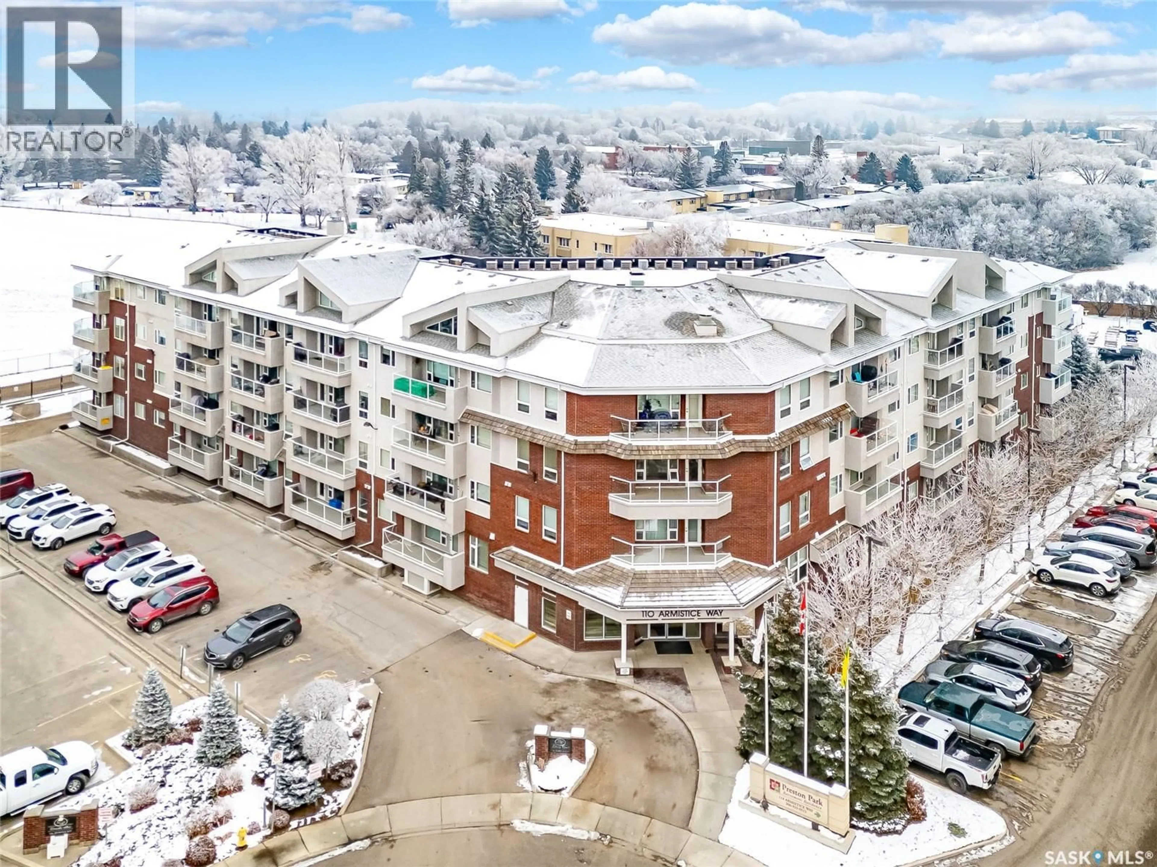 A pic from outside/outdoor area/front of a property/back of a property/a pic from drone, unknown for 110 - 414 ARMISTICE WAY, Saskatoon Saskatchewan S7J5L8