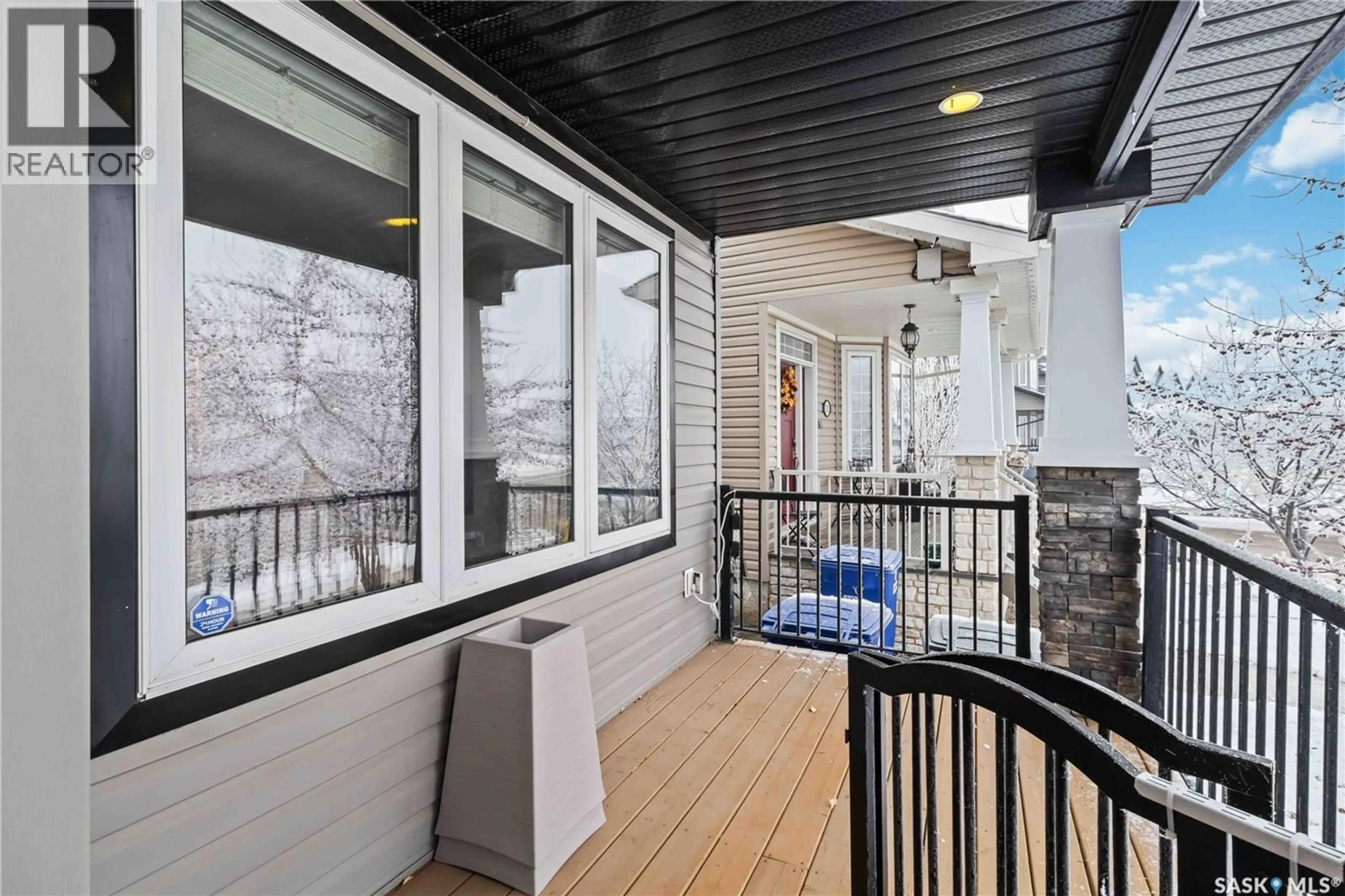 Patio, street for 706 STONEBRIDGE COMMON, Saskatoon Saskatchewan S7T0M9