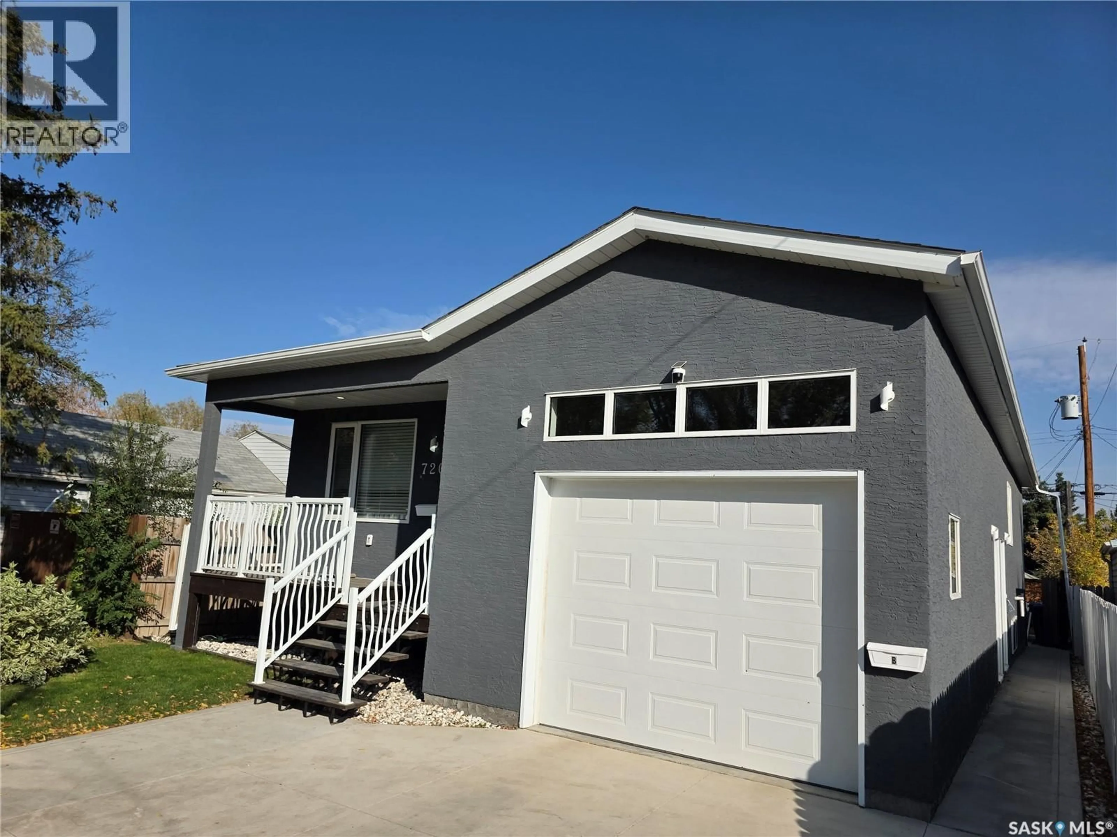 Home with vinyl exterior material, street for 720 O AVENUE, Saskatoon Saskatchewan S7M2S5