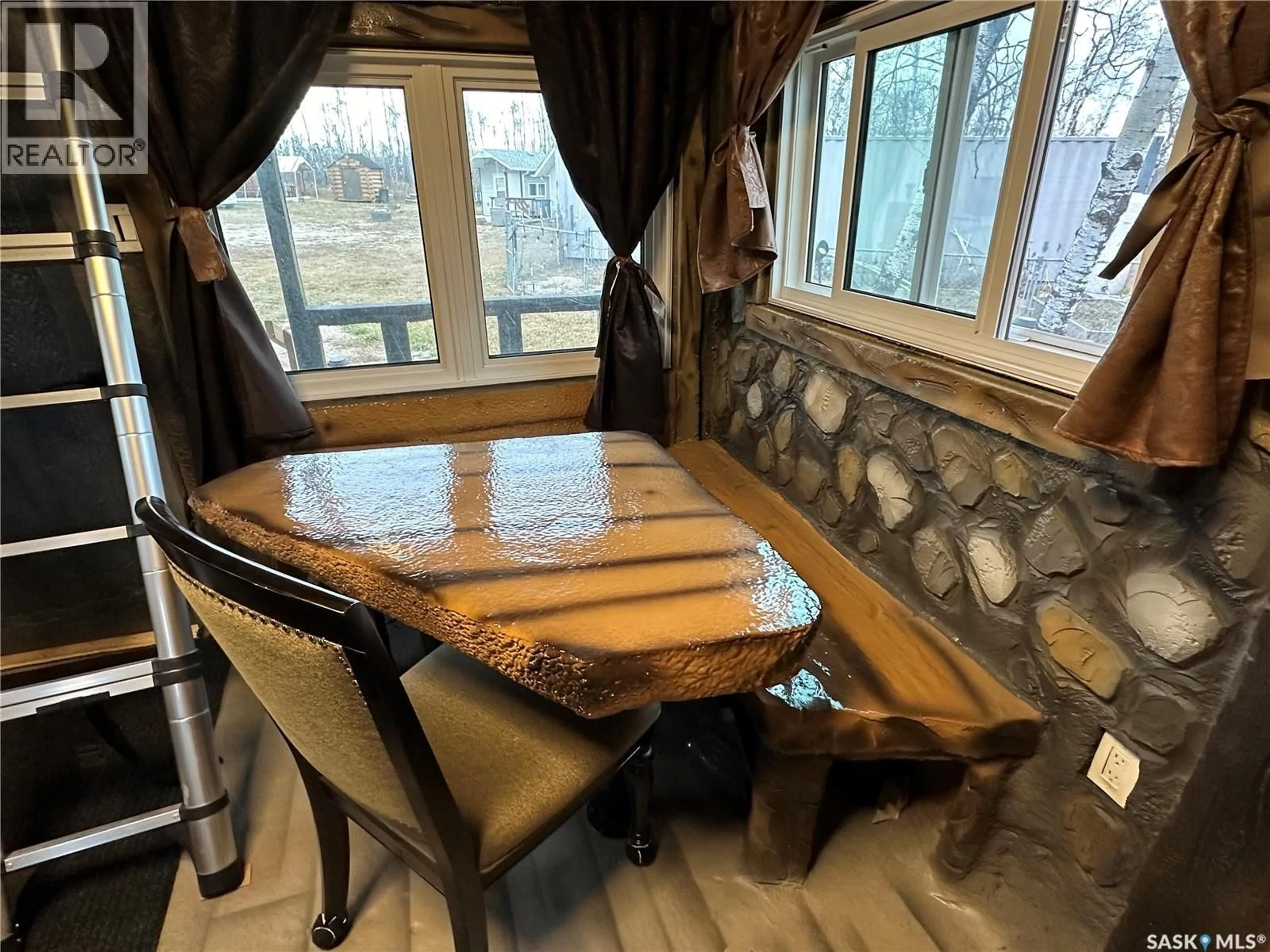 Dining room, wood/laminate floor for HUNTERS PARADISE, Fish Creek Rm No. 402 Saskatchewan S0K3R0