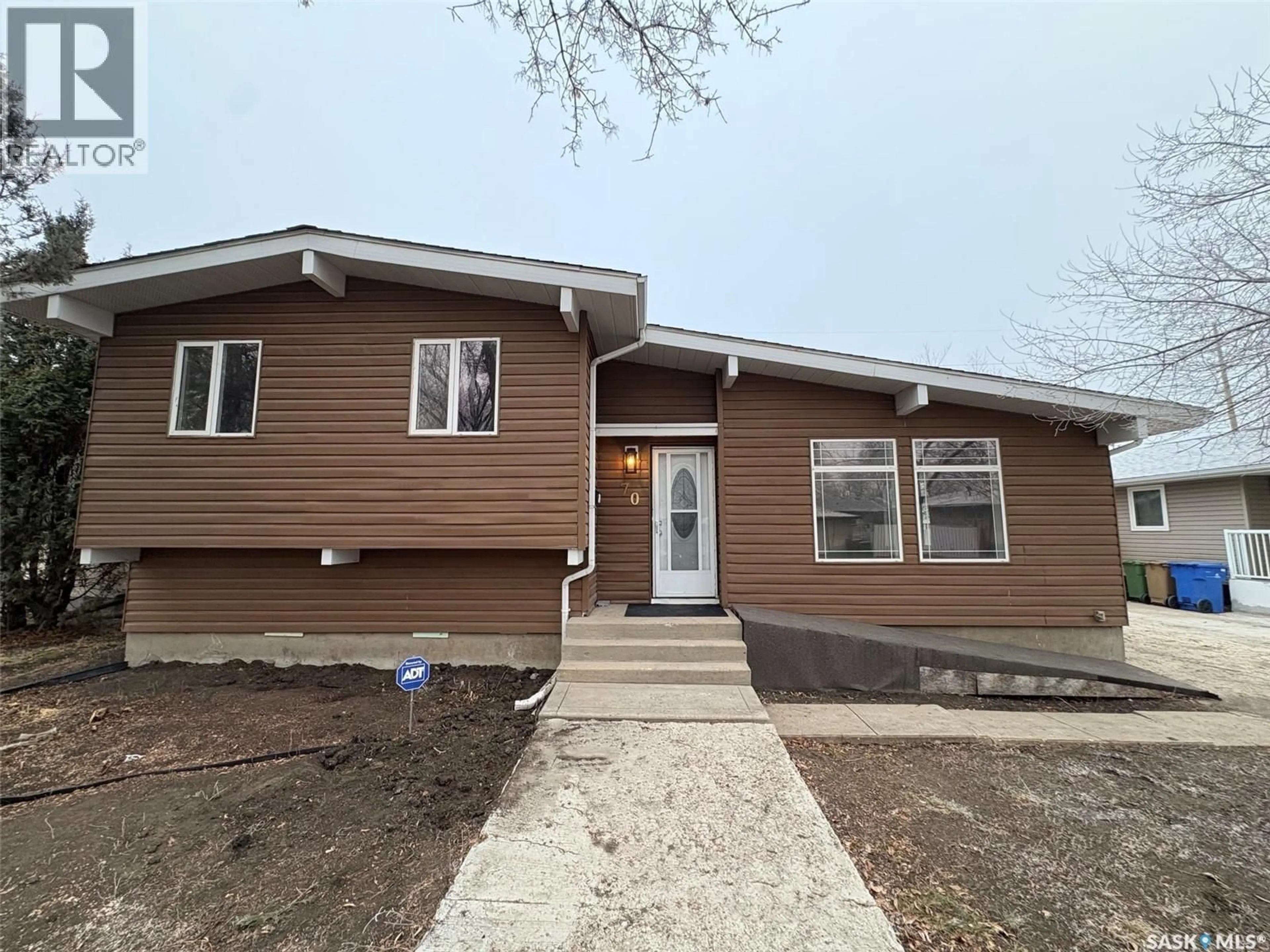 Home with vinyl exterior material, street for 70 DUTTON CRESCENT, Regina Saskatchewan S4N4E5