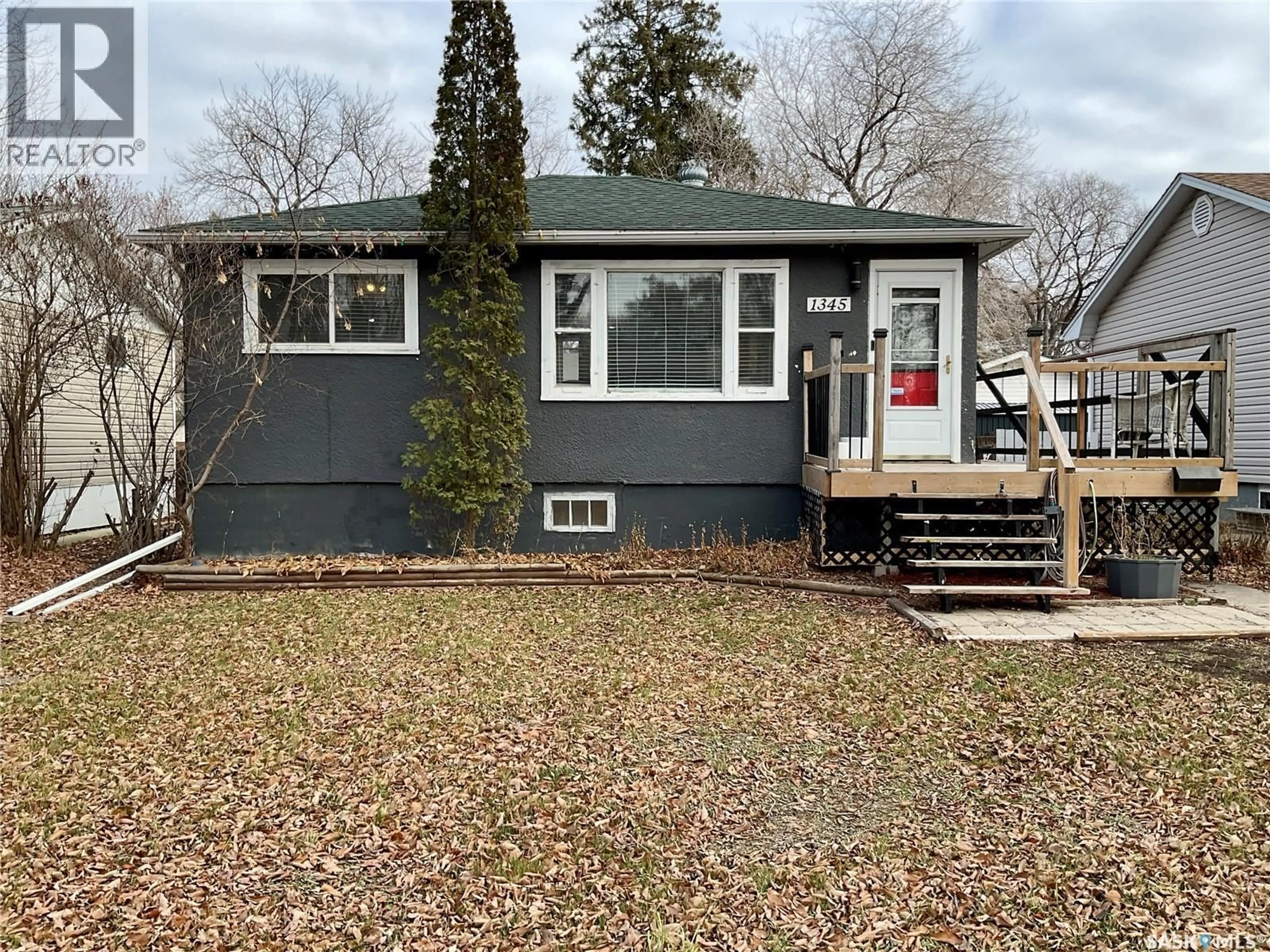 Home with vinyl exterior material, street for 1345 ABERDEEN STREET, Regina Saskatchewan S4T5K3