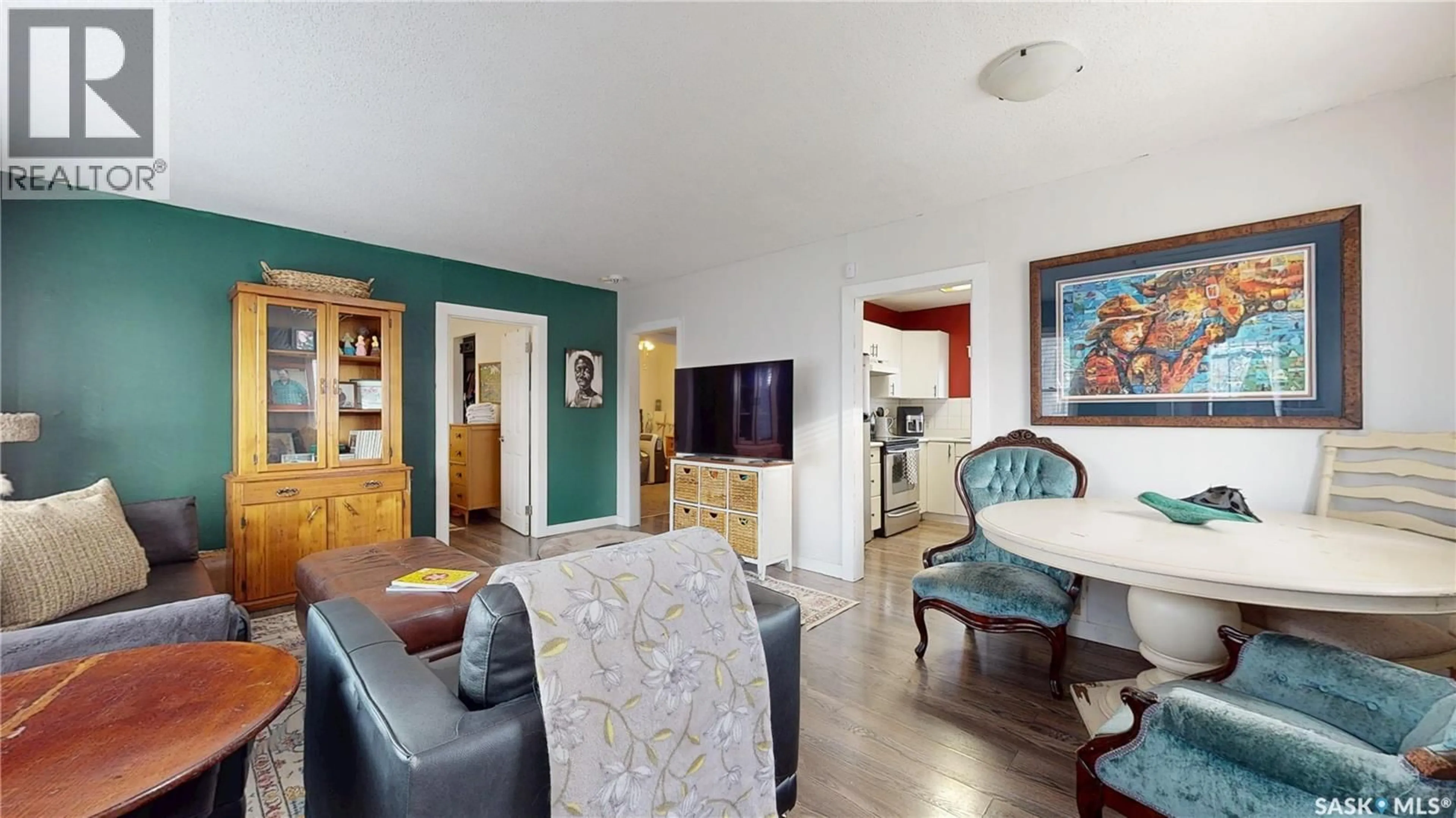 Living room with furniture, wood/laminate floor for 1345 ABERDEEN STREET, Regina Saskatchewan S4T5K3