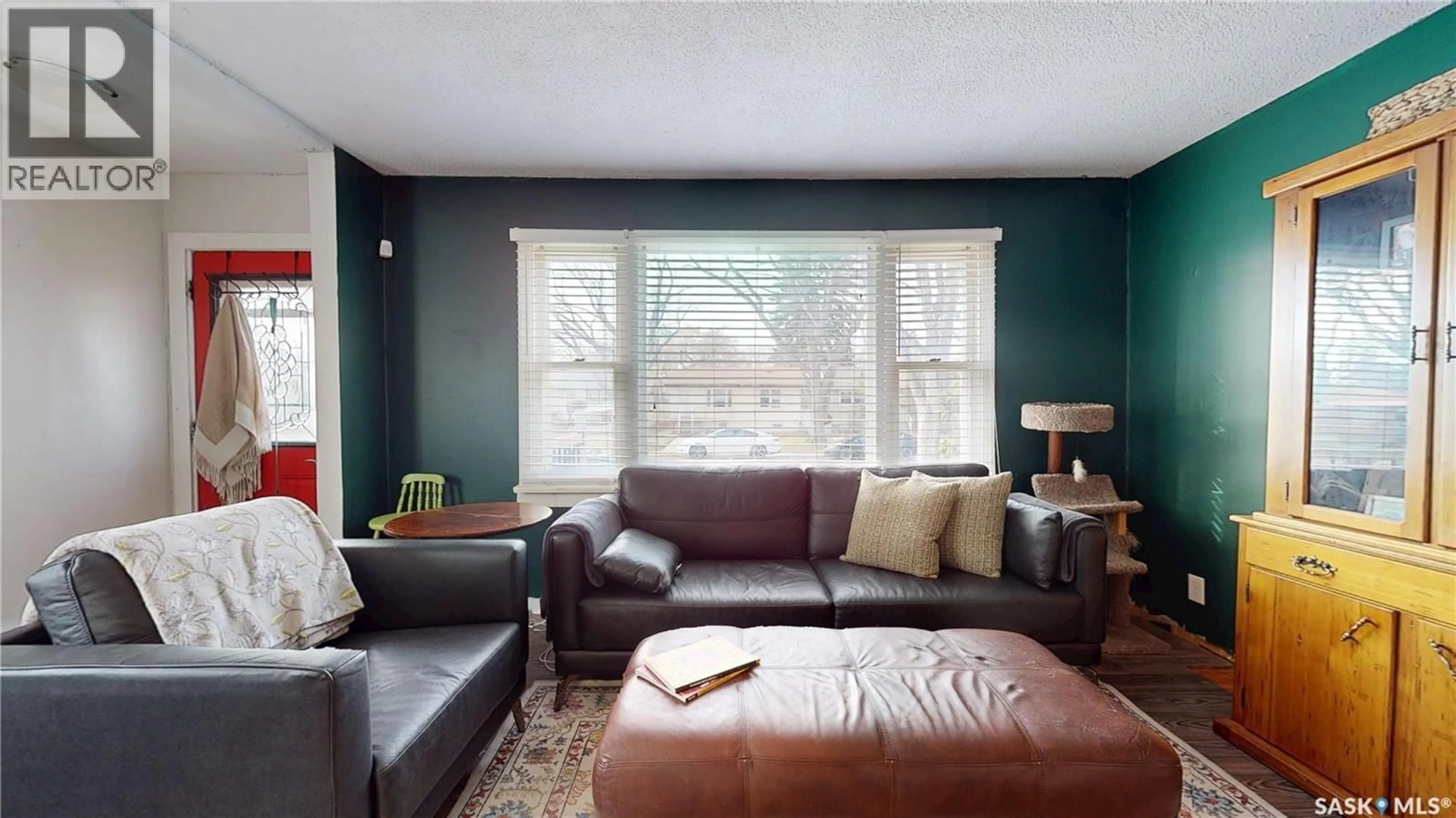 Living room with furniture, wood/laminate floor for 1345 ABERDEEN STREET, Regina Saskatchewan S4T5K3