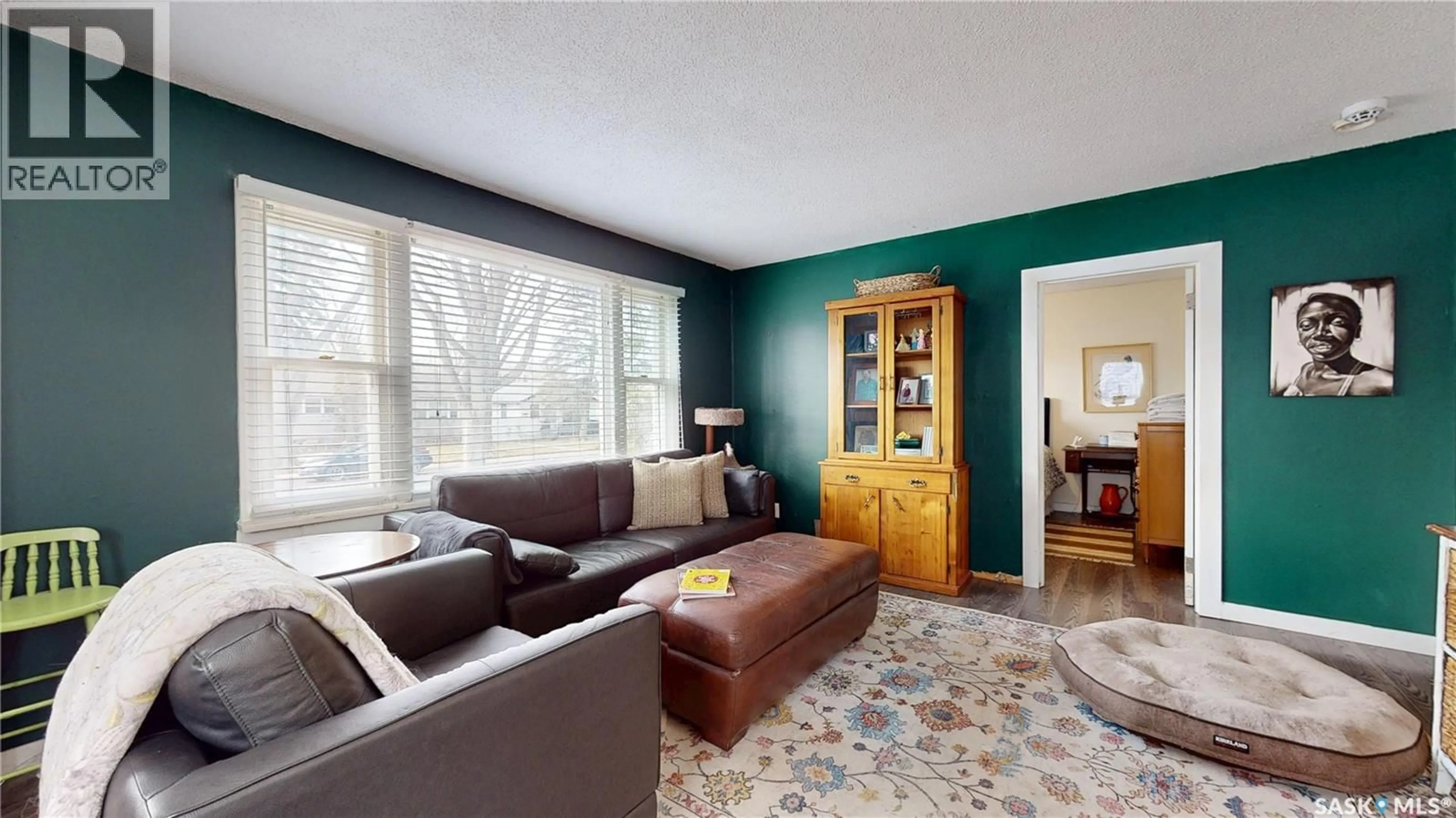 Living room with furniture, wood/laminate floor for 1345 ABERDEEN STREET, Regina Saskatchewan S4T5K3