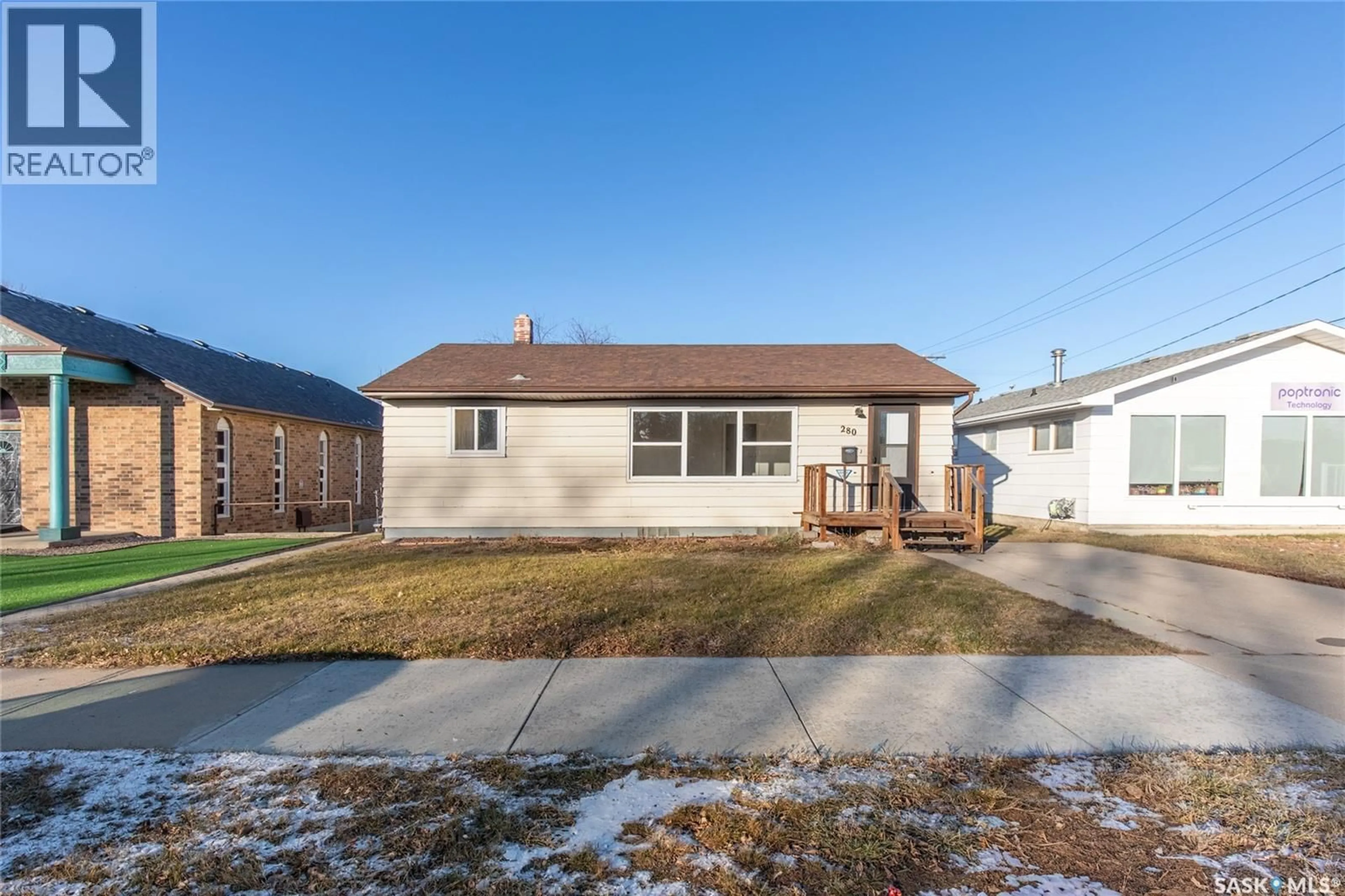 Home with brick exterior material, street for 280 ATHABASCA STREET E, Moose Jaw Saskatchewan S6H0L5