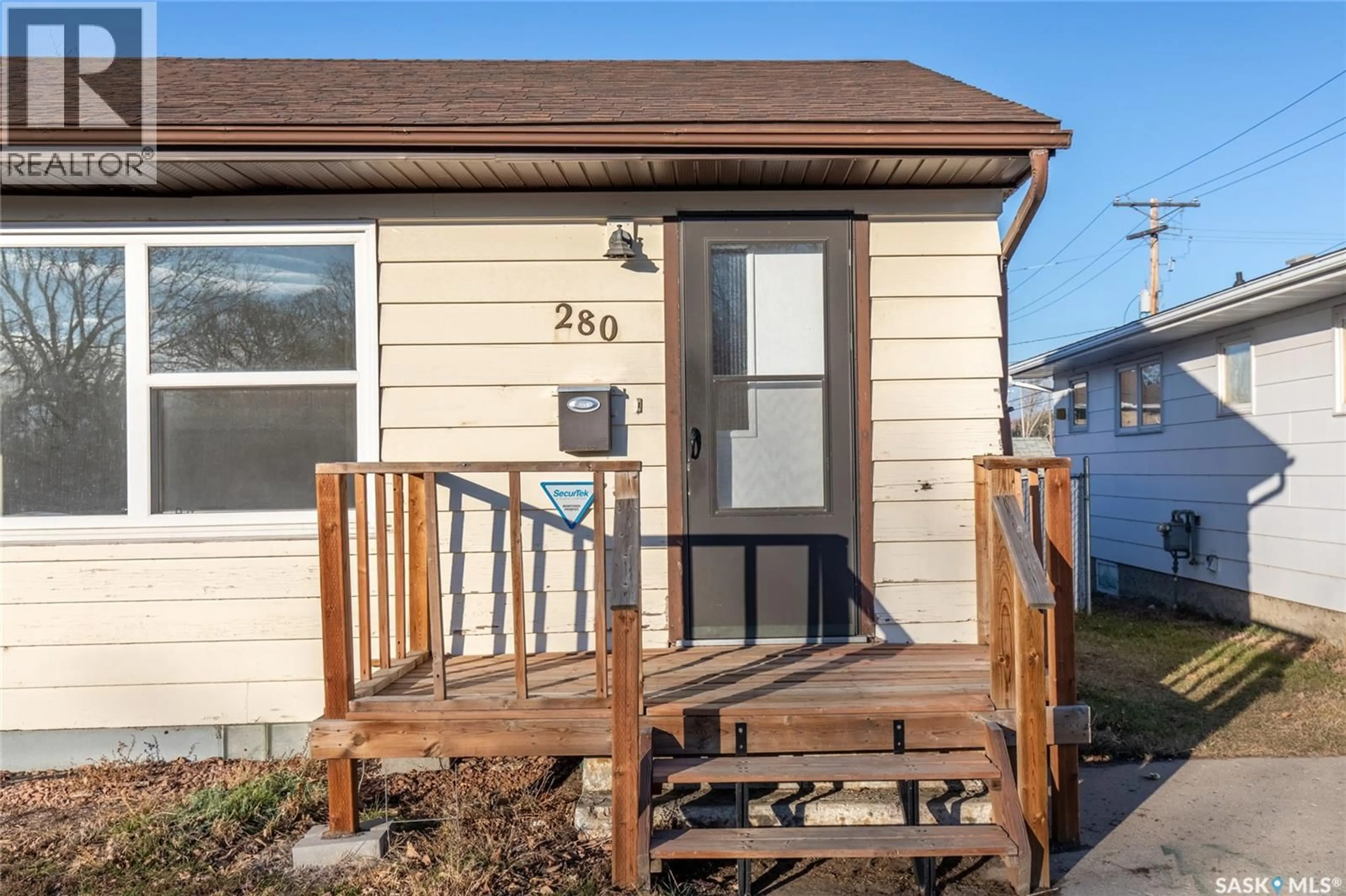 Home with vinyl exterior material, street for 280 ATHABASCA STREET E, Moose Jaw Saskatchewan S6H0L5