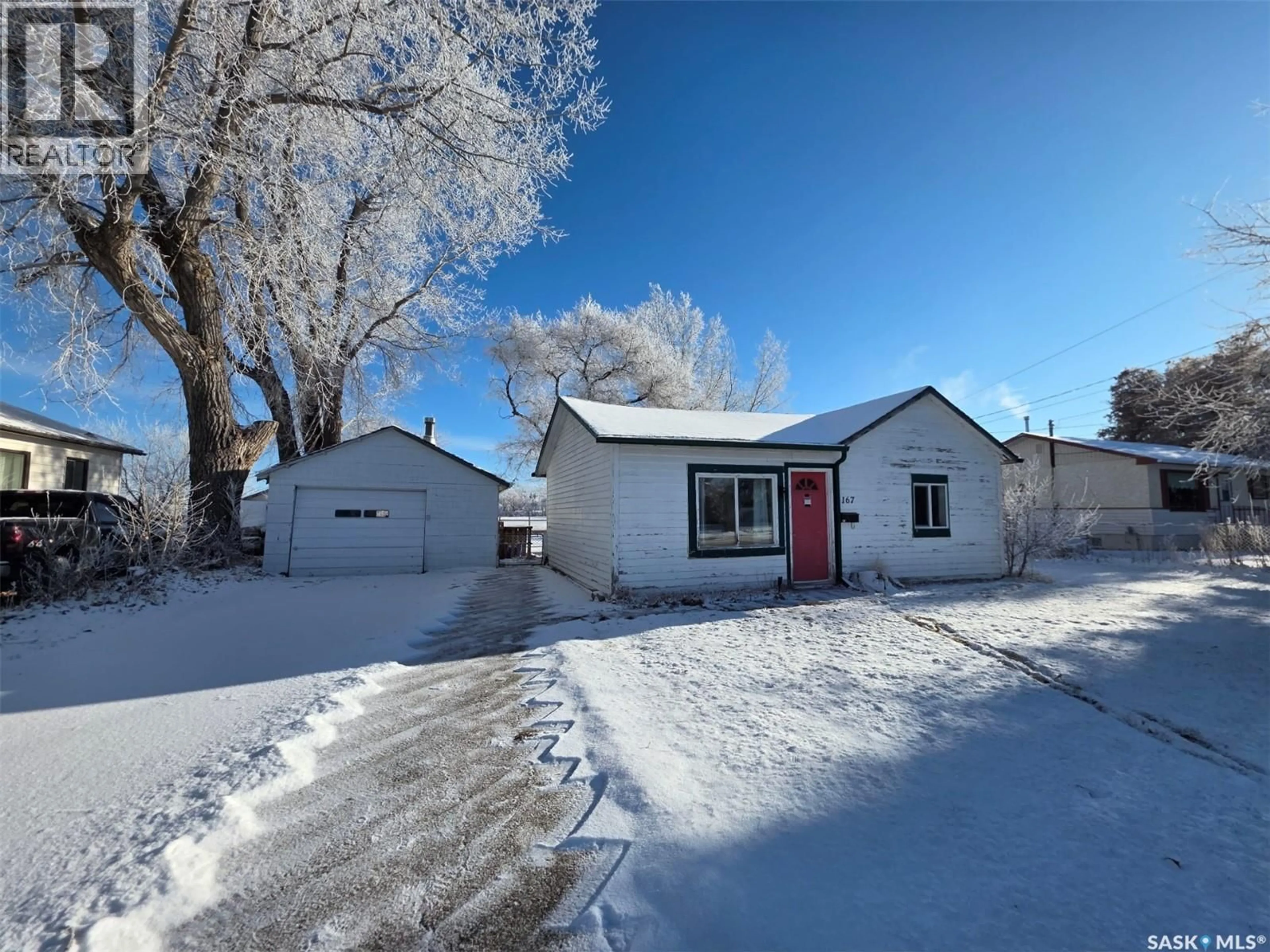 A pic from outside/outdoor area/front of a property/back of a property/a pic from drone, street for 167 11TH AVENUE, Swift Current Saskatchewan S9H3R6