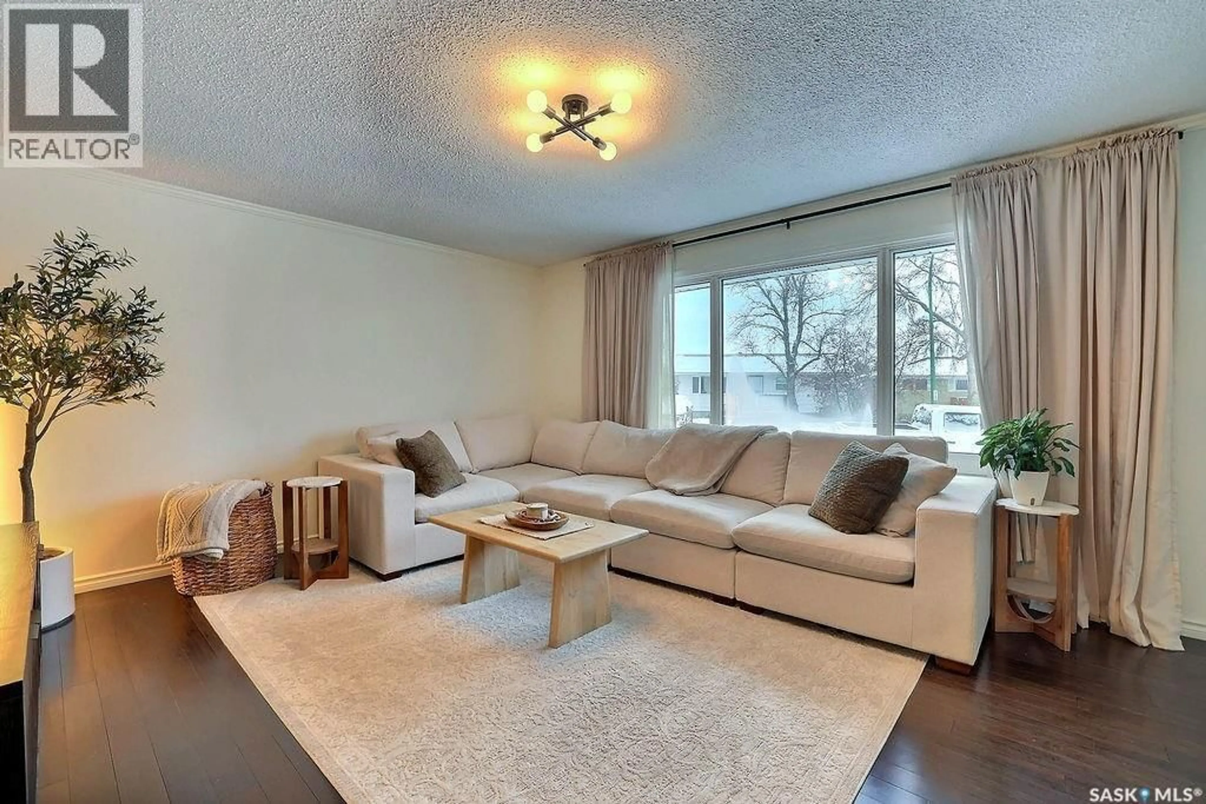 Living room with furniture, unknown for 66 SNEATH CRESCENT, Regina Saskatchewan S4R5P9