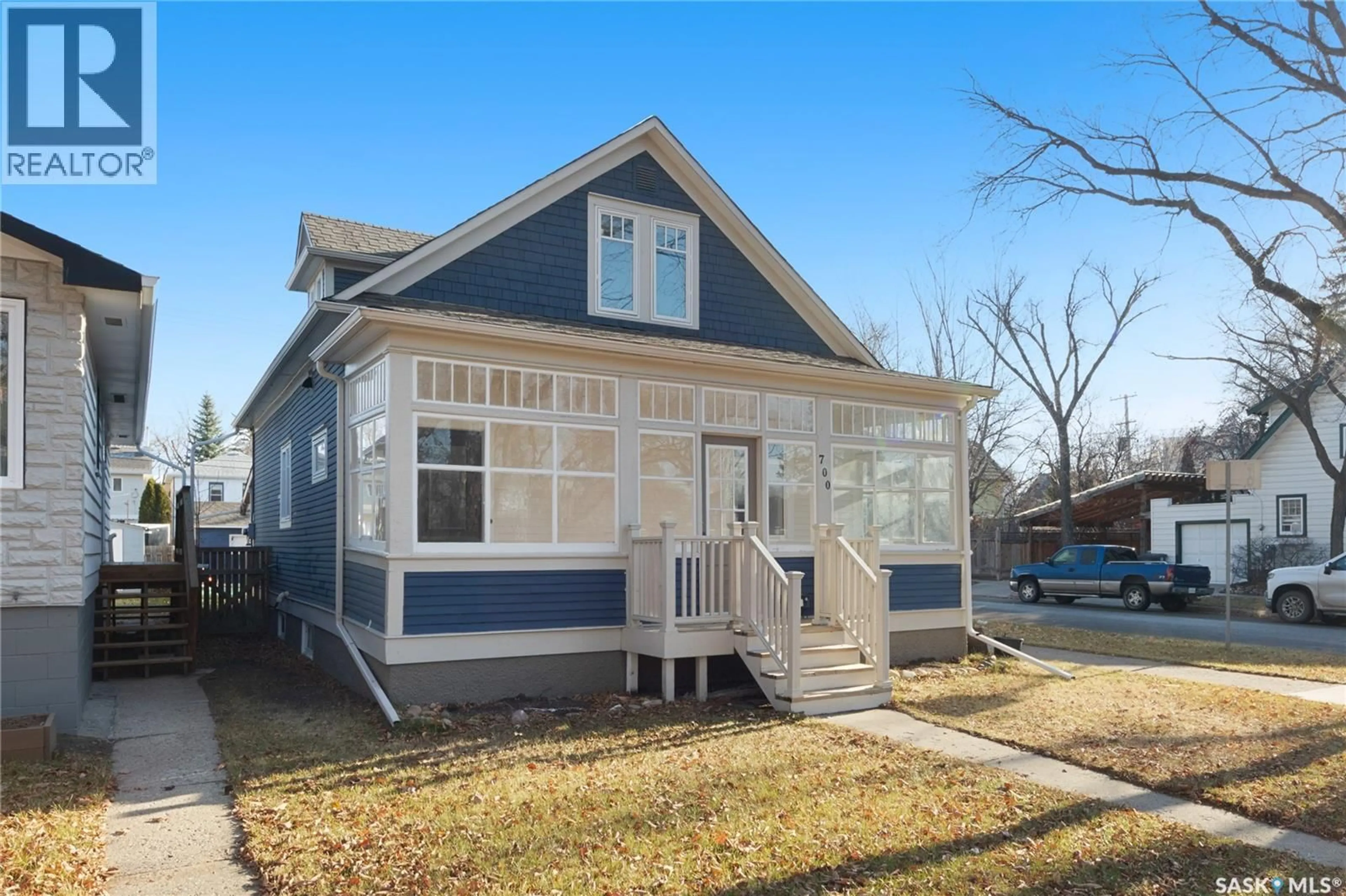 Home with vinyl exterior material, street for 700 5TH AVENUE, Saskatoon Saskatchewan S7K2R5