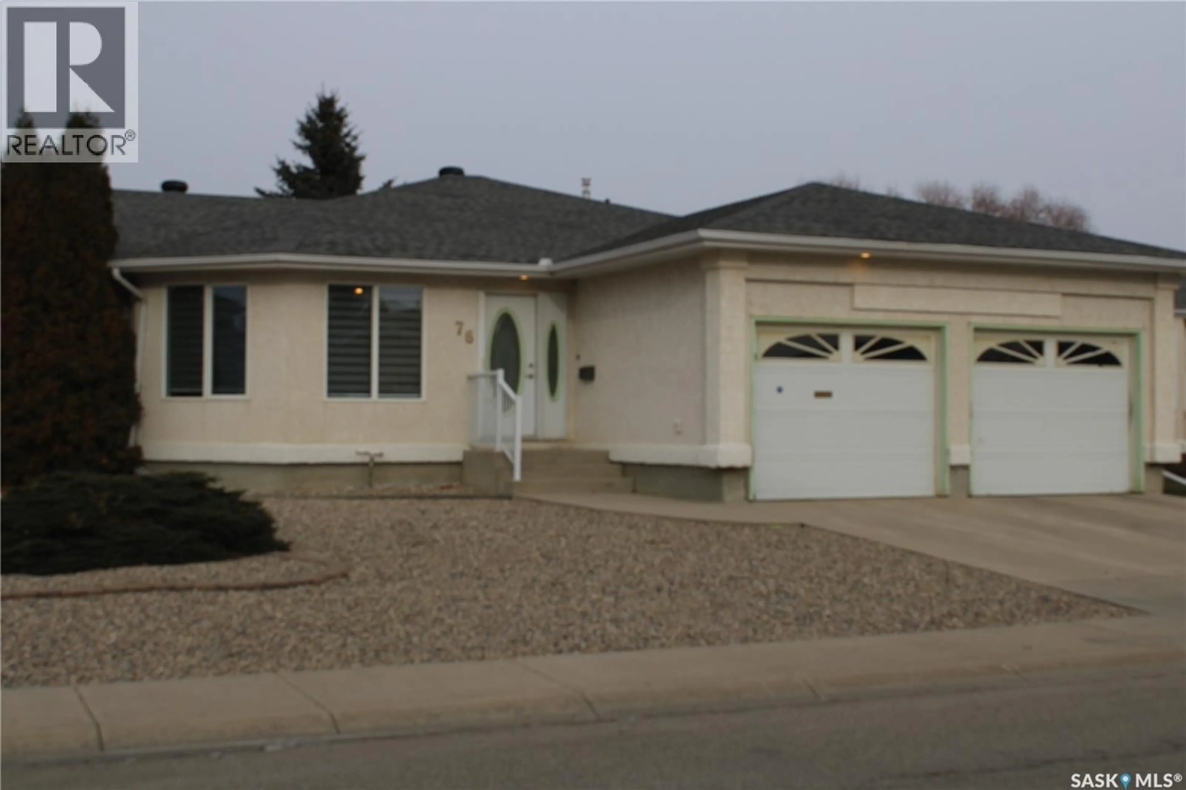 Home with vinyl exterior material, street for 76 RUSSELL DRIVE, Yorkton Saskatchewan S3N3W2