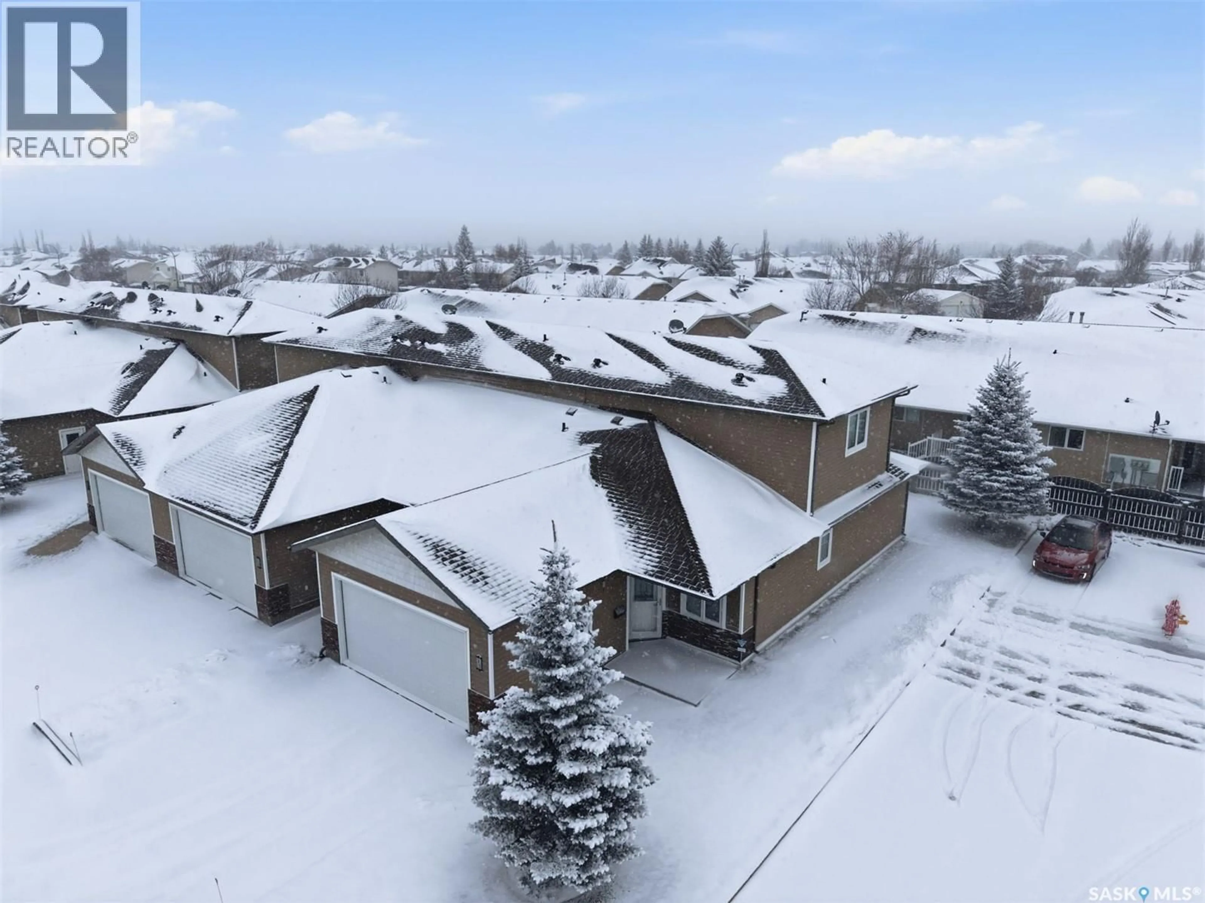 A pic from outside/outdoor area/front of a property/back of a property/a pic from drone, mountain view for 31 100 BROOKLYN LANE, Warman Saskatchewan S0K0A1