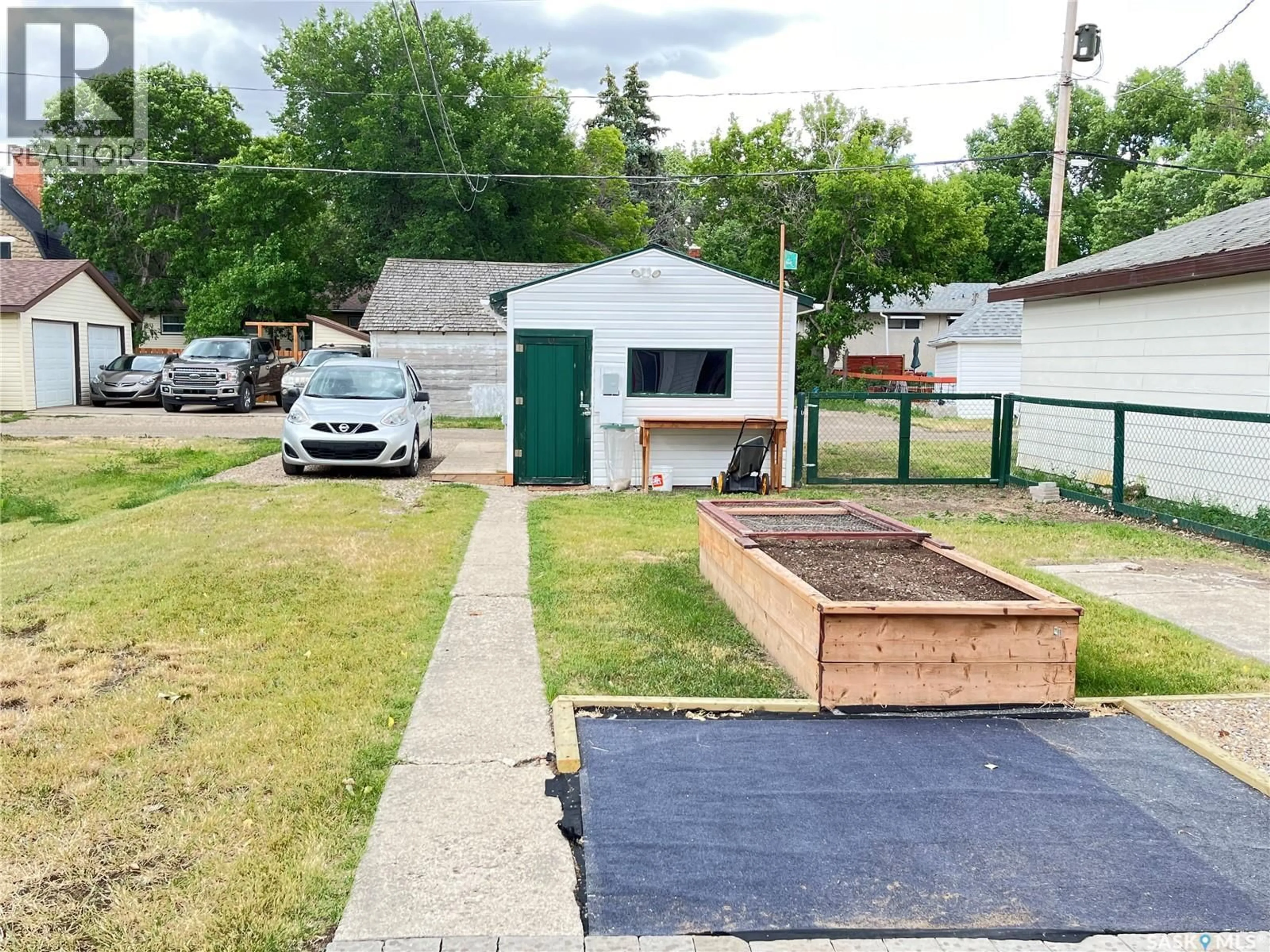 A pic from outside/outdoor area/front of a property/back of a property/a pic from drone, street for 408 MAPLE STREET, Maple Creek Saskatchewan S0N1N0
