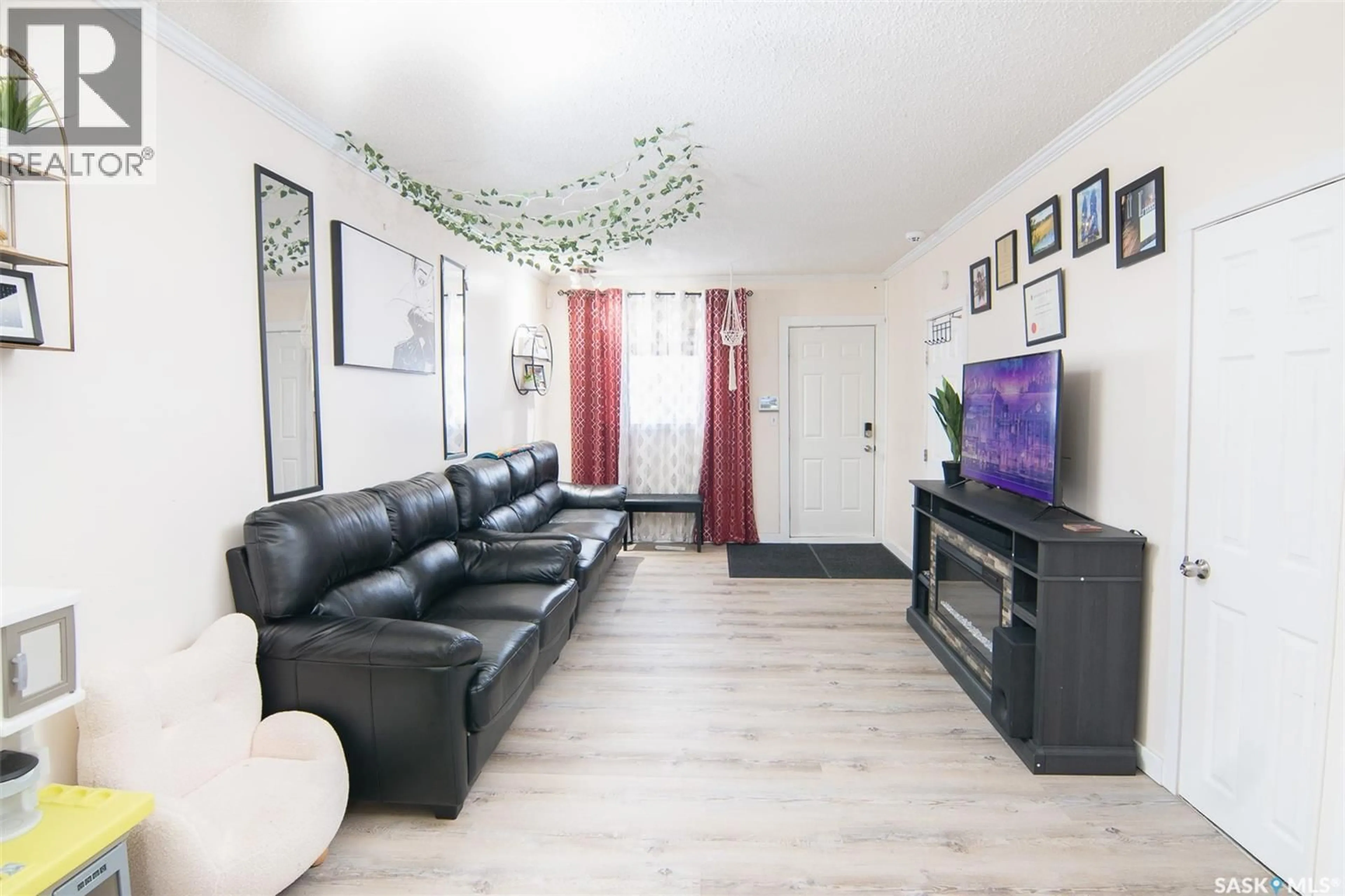 Living room with furniture, unknown for 625 7TH STREET, Prince Albert Saskatchewan S6V0S7