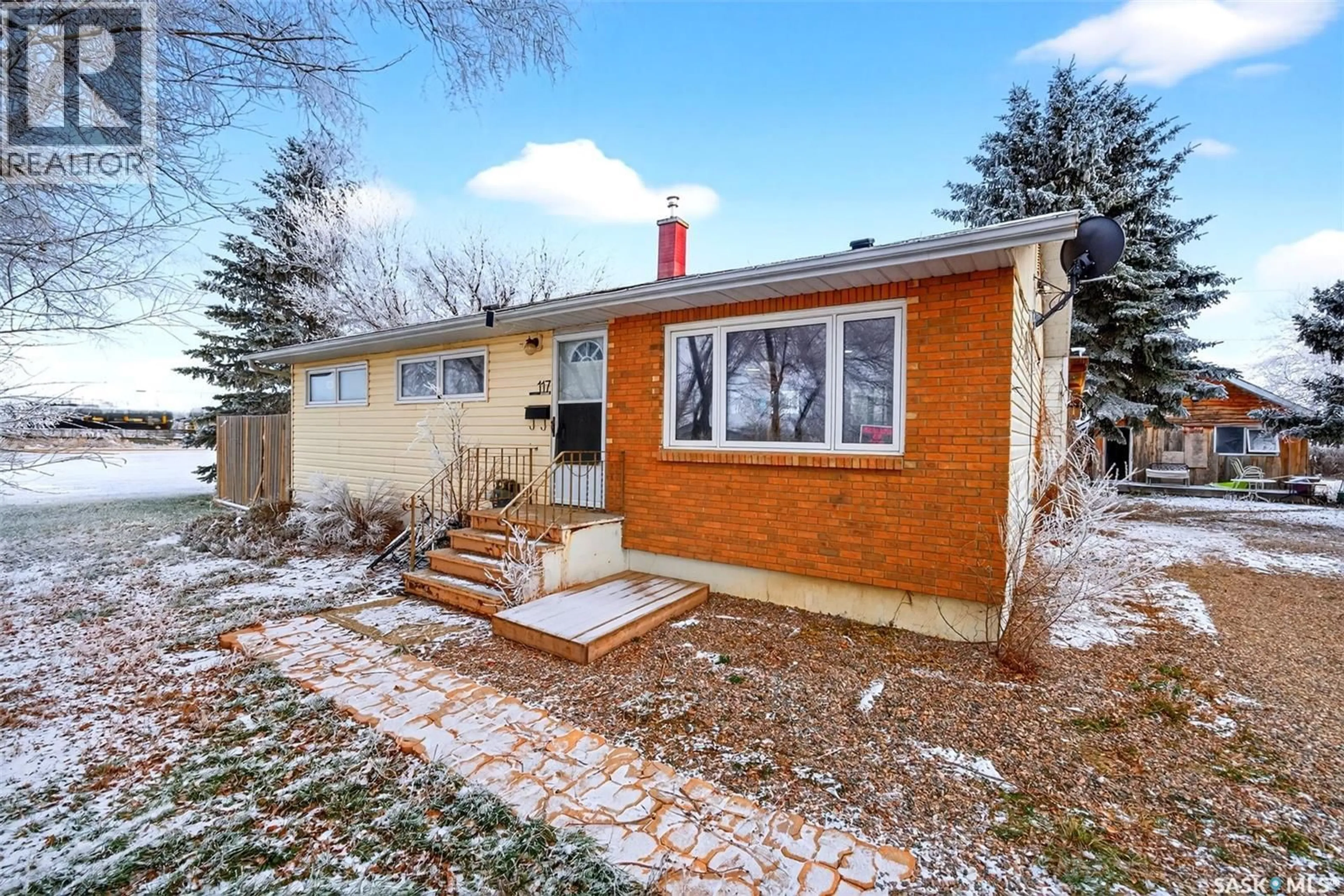 Home with brick exterior material, street for 117 3RD STREET, Drinkwater Saskatchewan S0H1G0