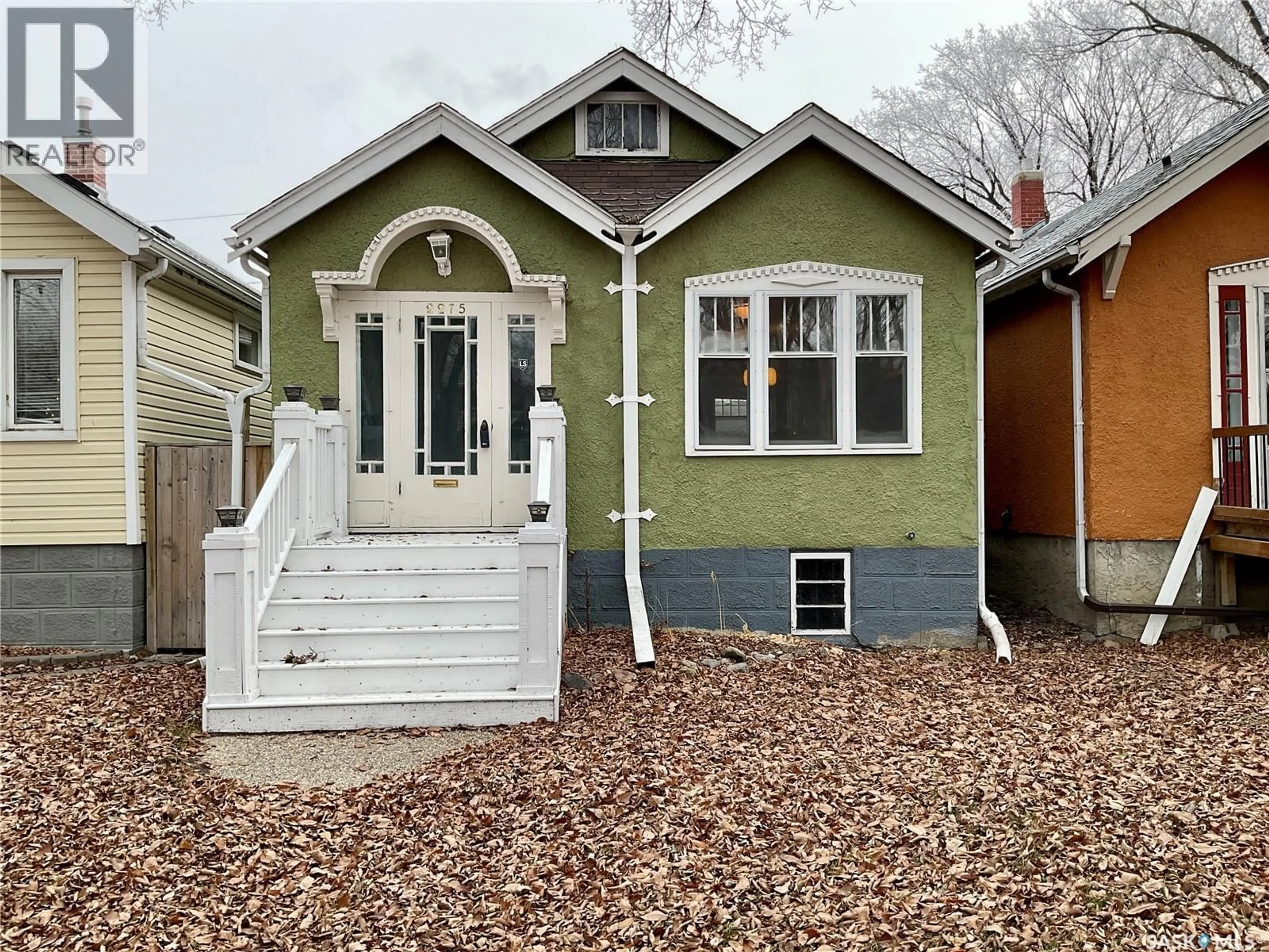 Home with vinyl exterior material, street for 2275 QUEBEC STREET, Regina Saskatchewan S4P1K3