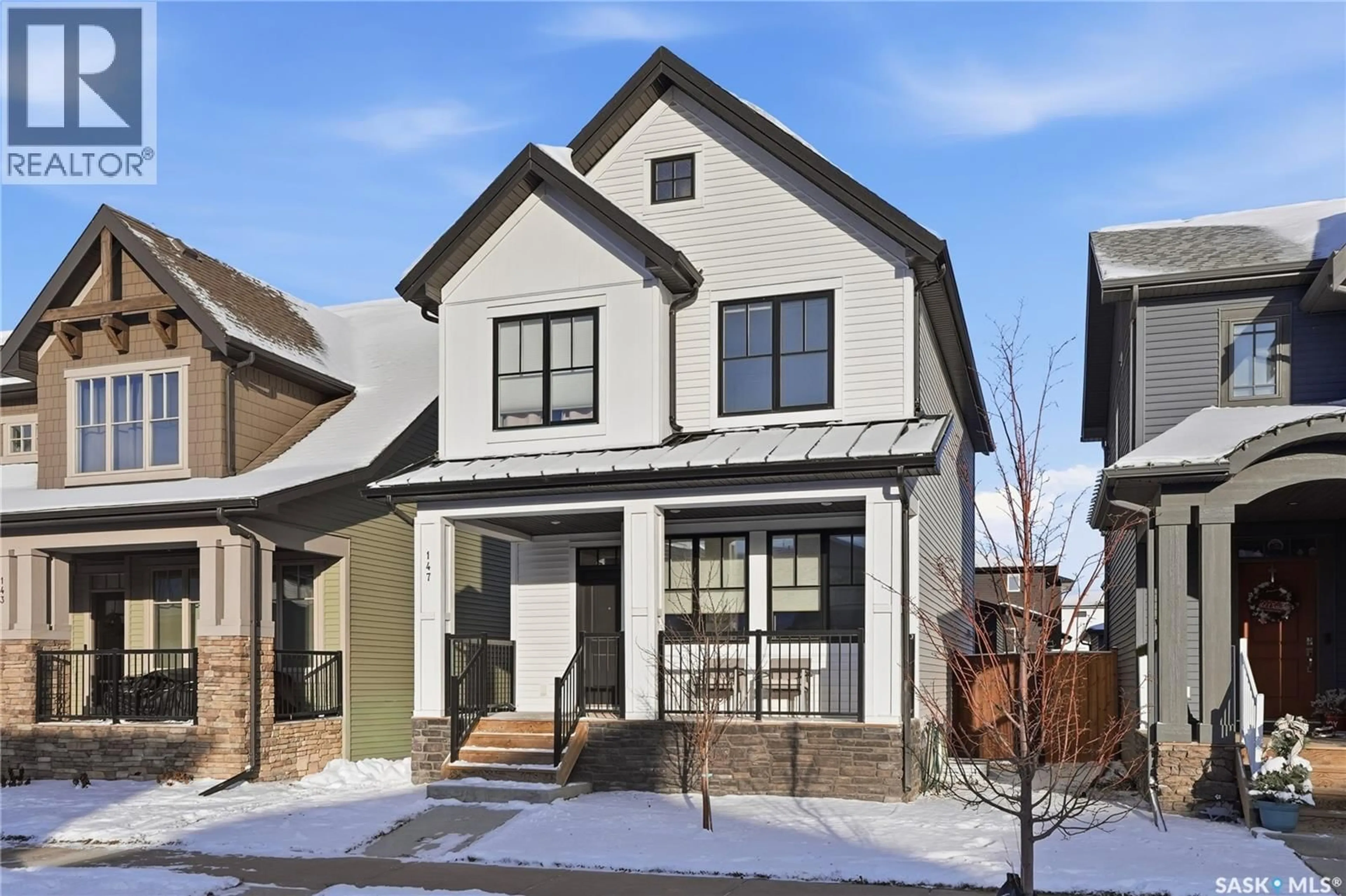 Home with brick exterior material, street for 147 TAUBE AVENUE, Saskatoon Saskatchewan S7V0W1