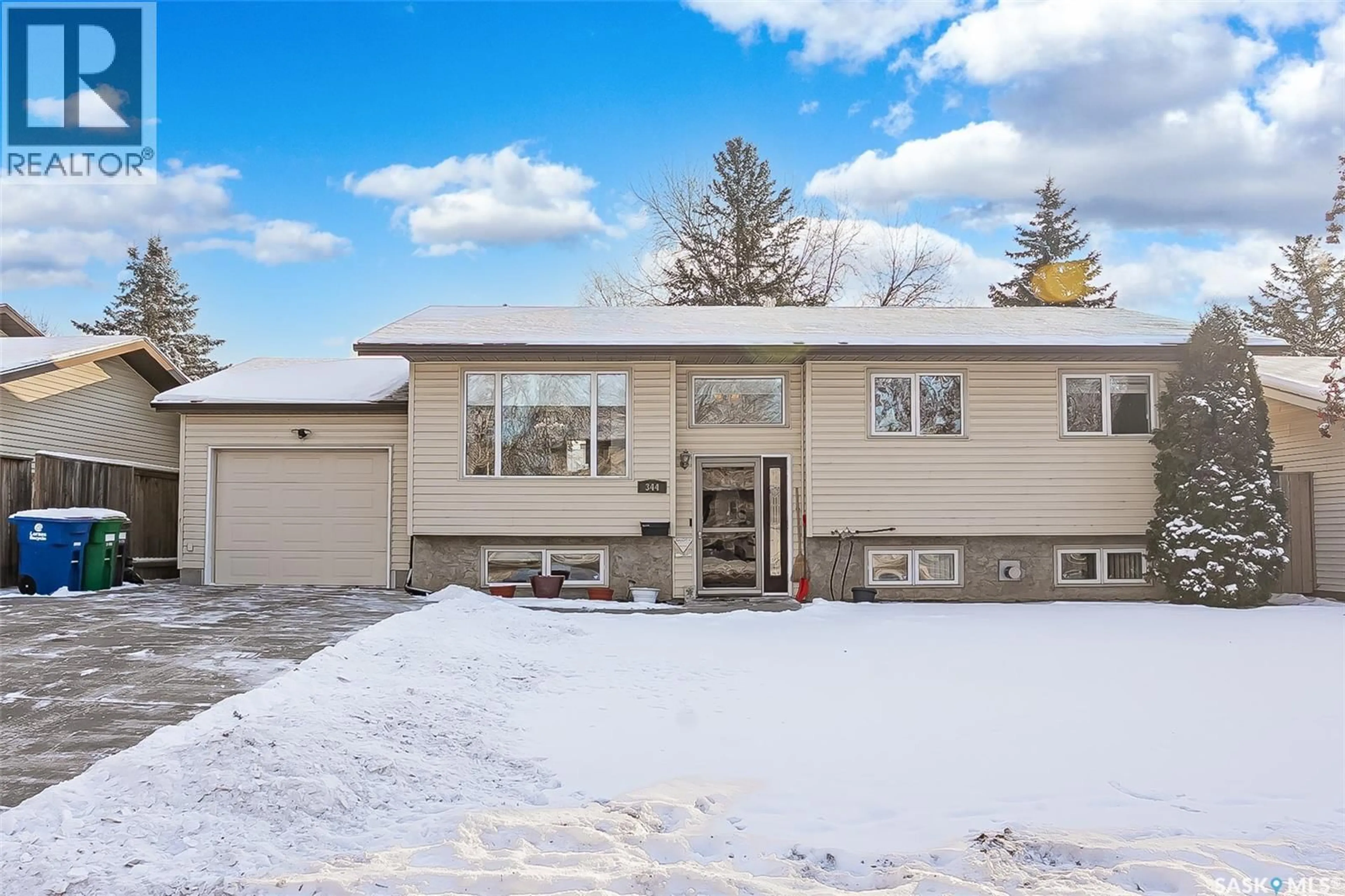 Home with vinyl exterior material, street for 344 RUSSELL ROAD, Saskatoon Saskatchewan S7K6P2