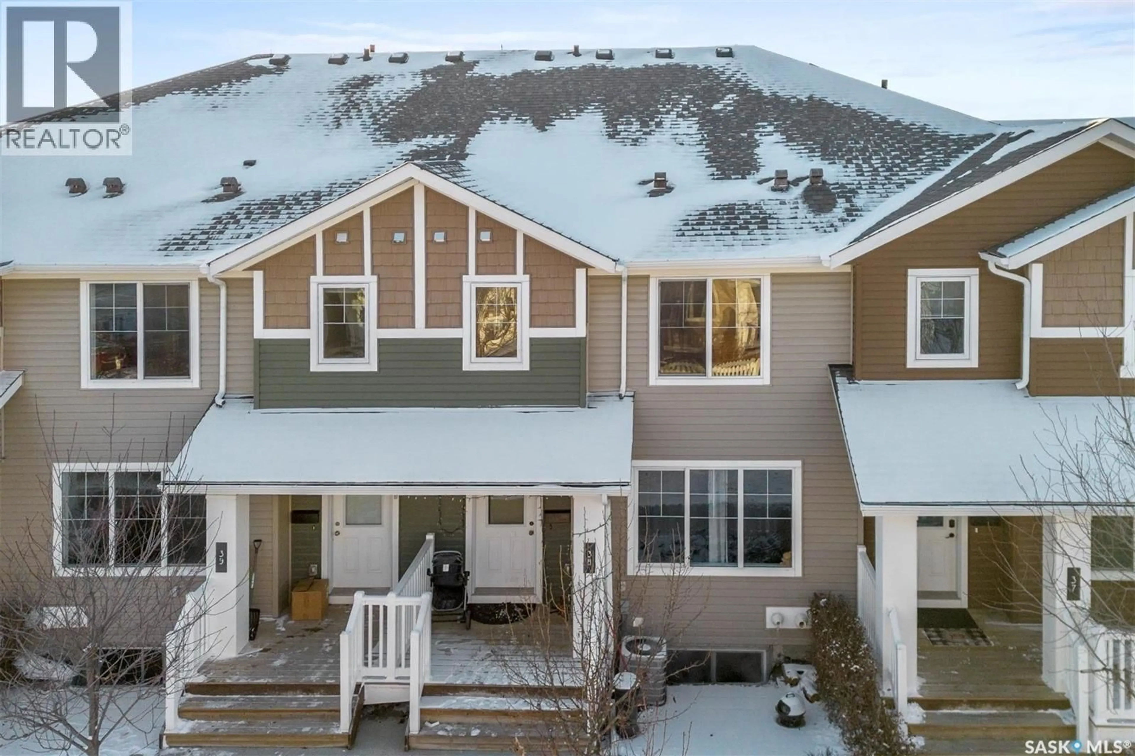 A pic from outside/outdoor area/front of a property/back of a property/a pic from drone, mountain view for 39 - 5702 GORDON ROAD, Regina Saskatchewan S4W0M1