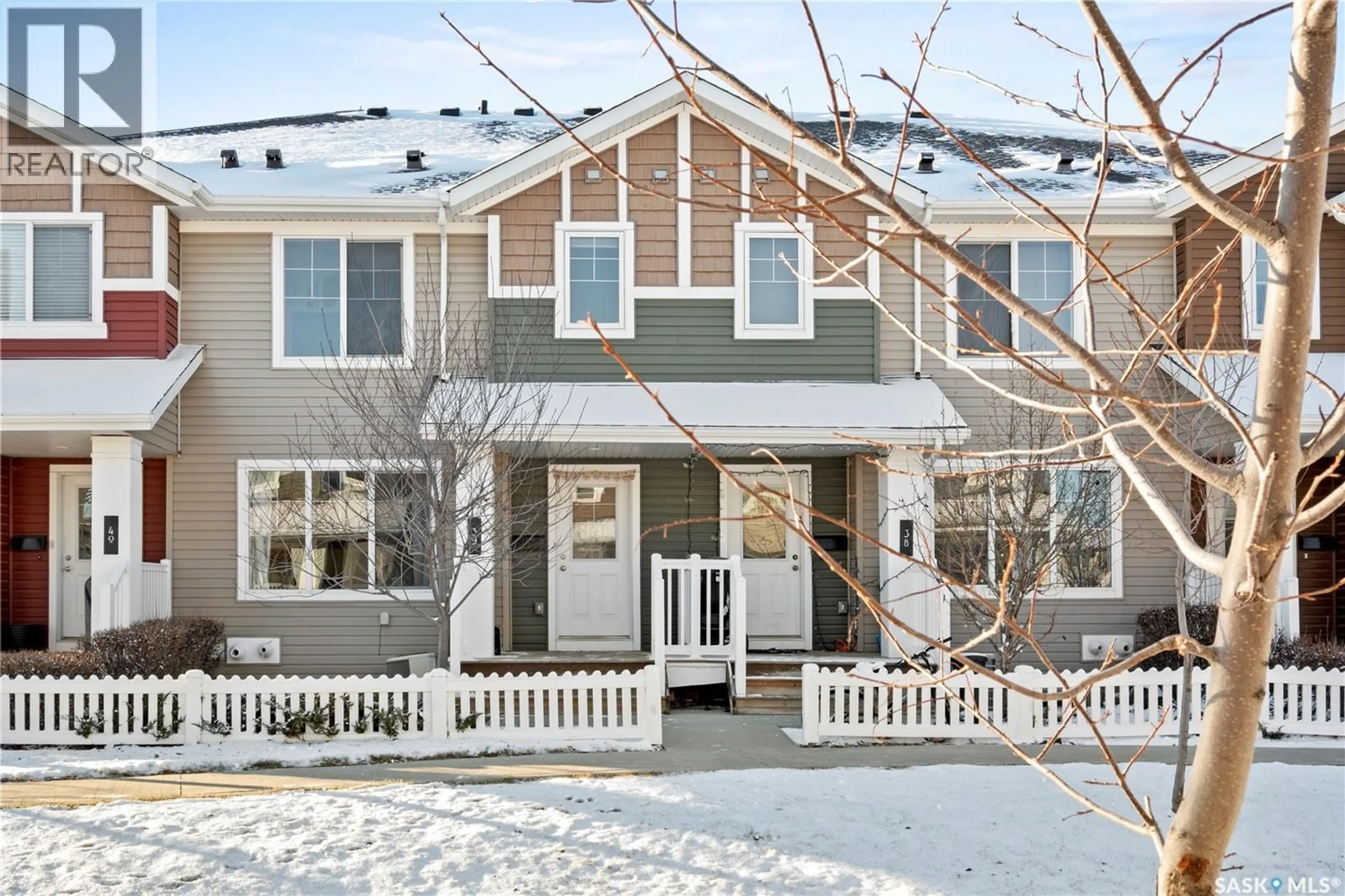 Home with vinyl exterior material, street for 39 - 5702 GORDON ROAD, Regina Saskatchewan S4W0M1