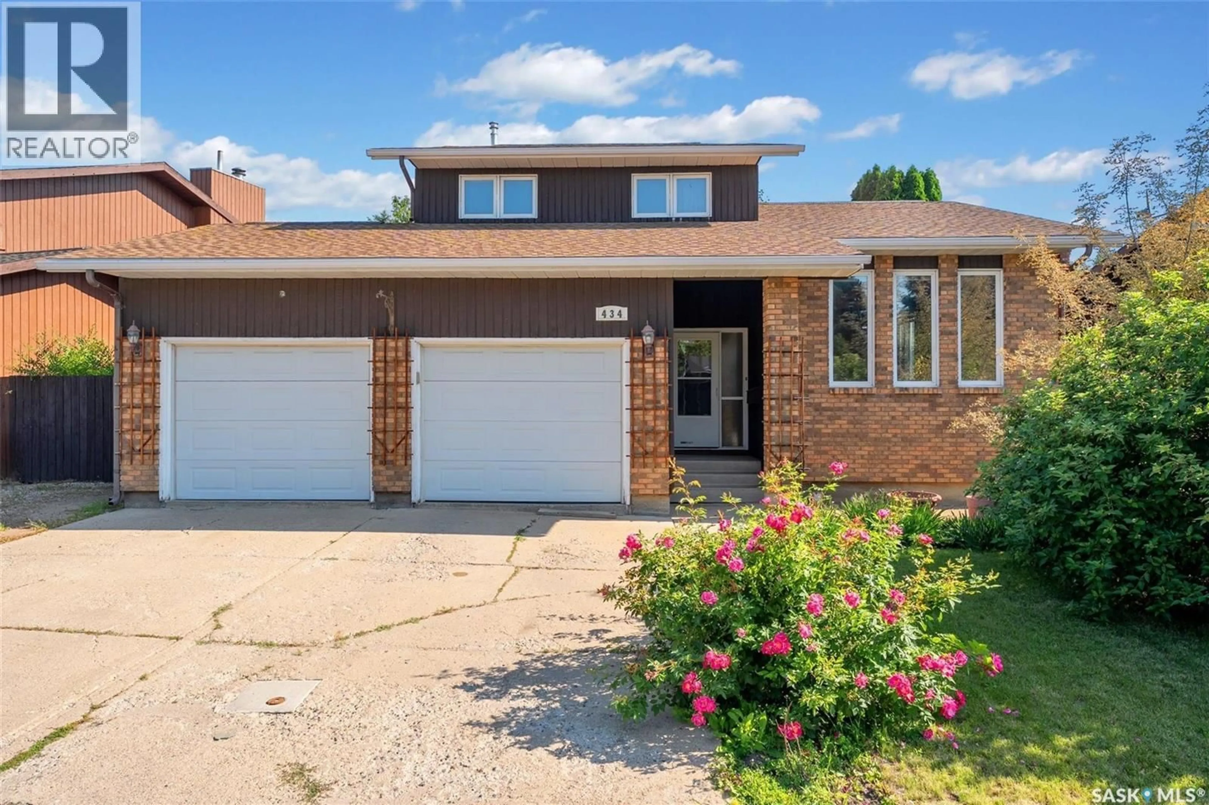 Home with brick exterior material, street for 434 DELARONDE ROAD, Saskatoon Saskatchewan S7J3Y7