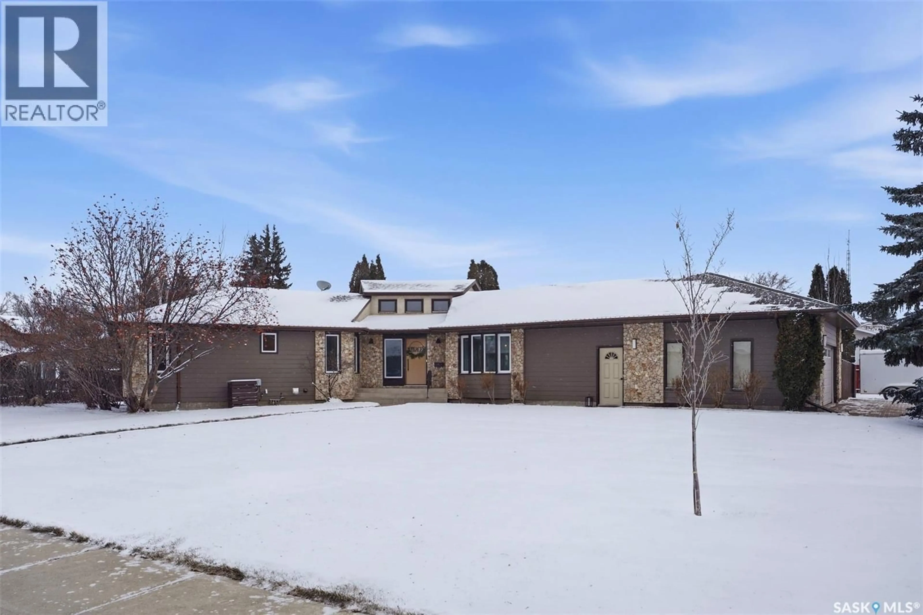 A pic from outside/outdoor area/front of a property/back of a property/a pic from drone, street for 4 BARNES CRESCENT, Humboldt Saskatchewan S0K2A0