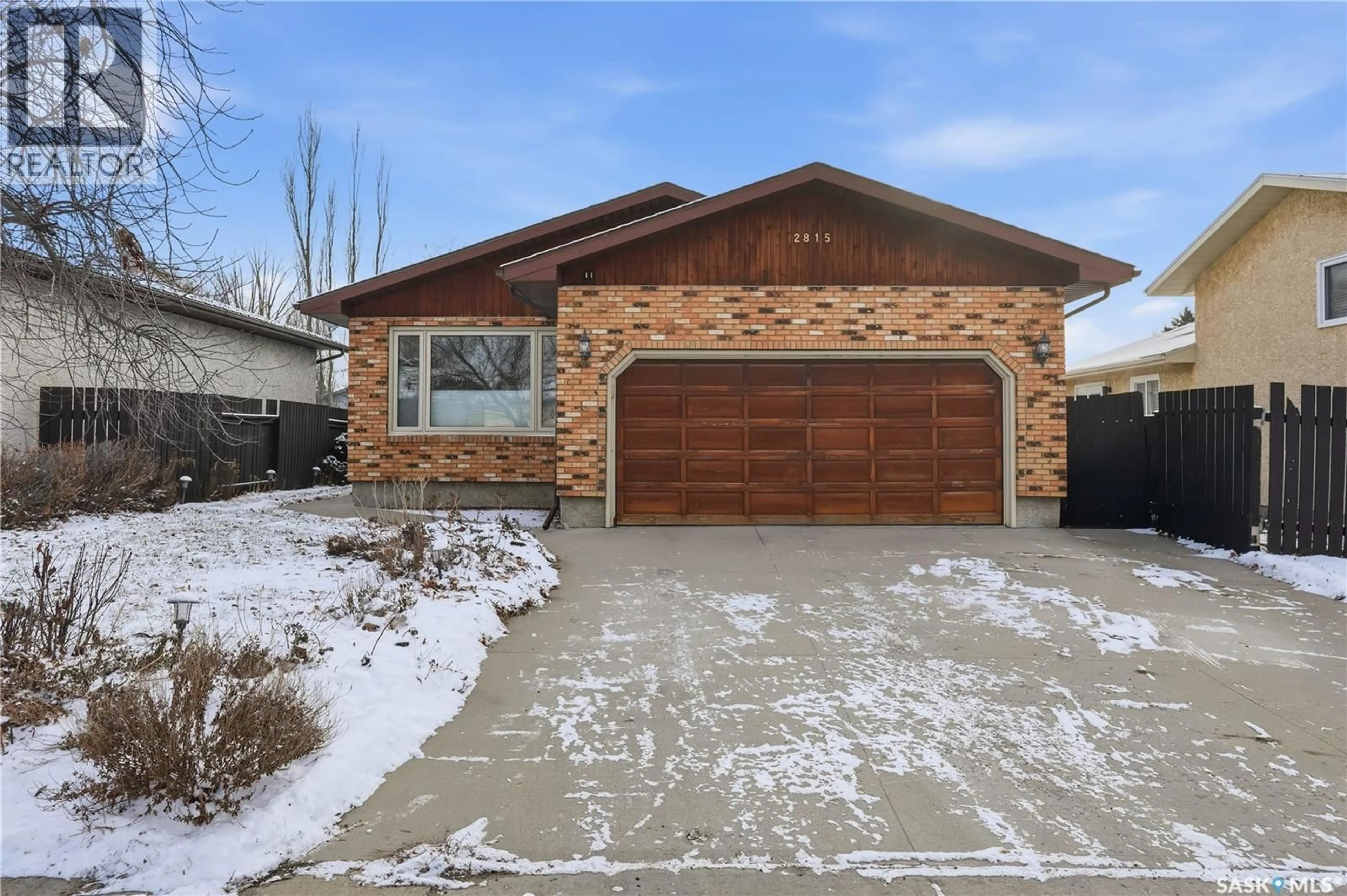 Home with brick exterior material, street for 2815 CORBETT ROAD, Regina Saskatchewan S4R8J1