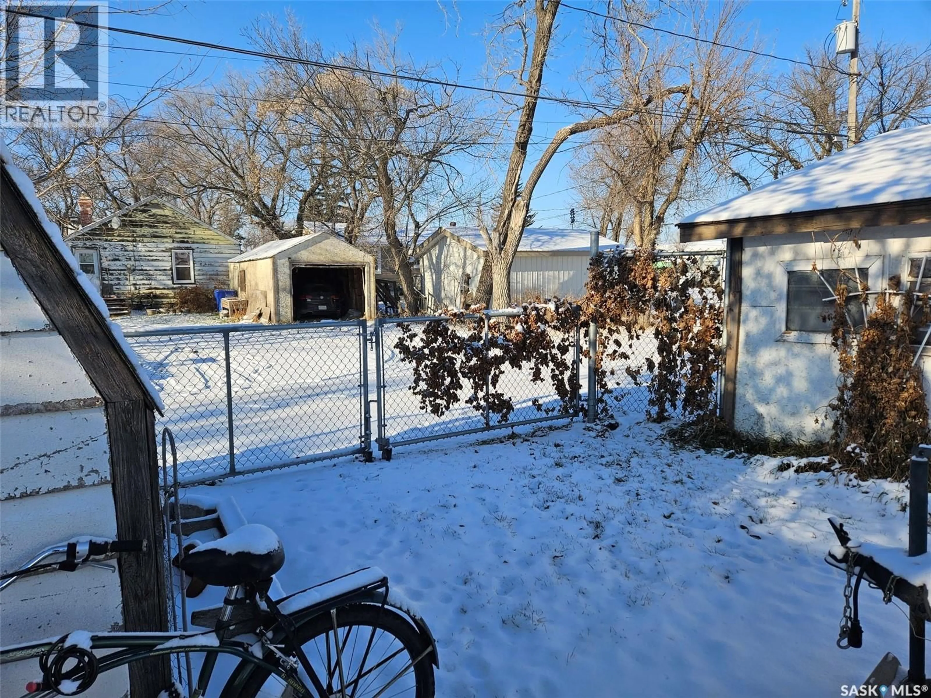 A pic from outside/outdoor area/front of a property/back of a property/a pic from drone, street for 108 1ST STREET, Carlyle Saskatchewan S0C0R0