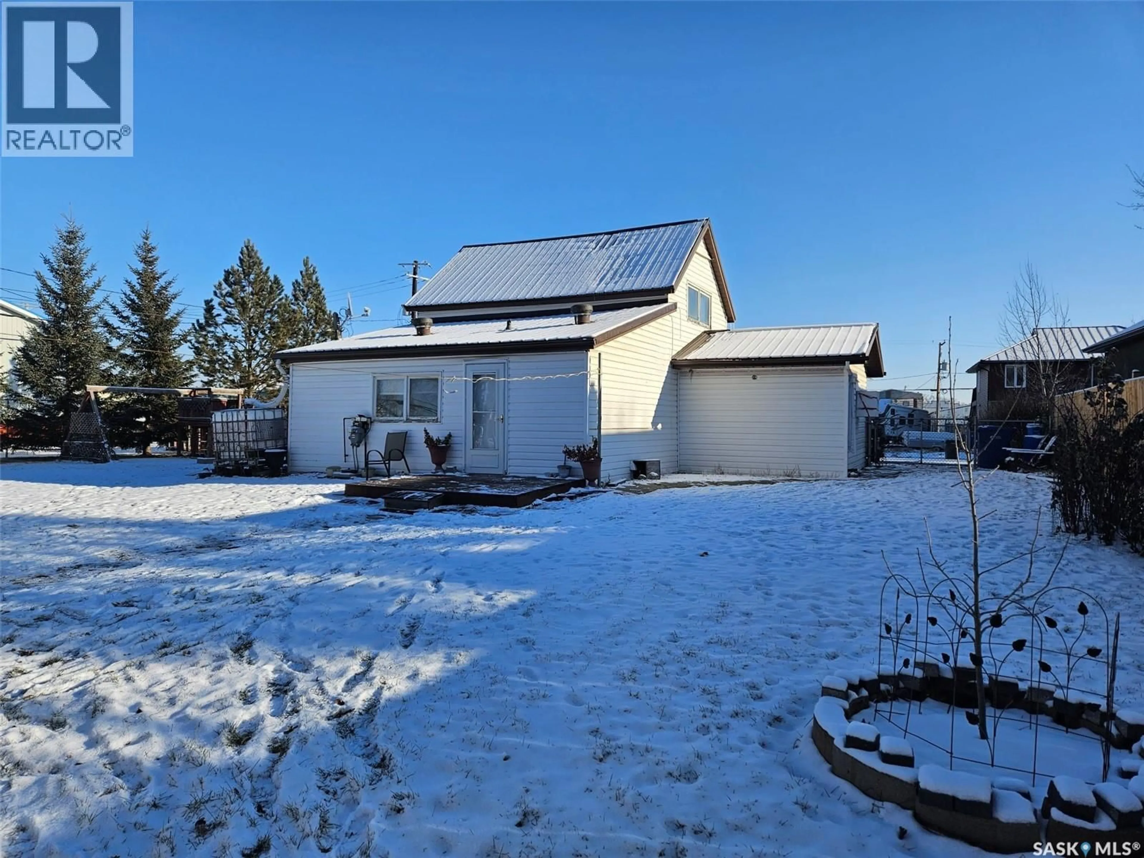 A pic from outside/outdoor area/front of a property/back of a property/a pic from drone, street for 108 1ST STREET, Carlyle Saskatchewan S0C0R0