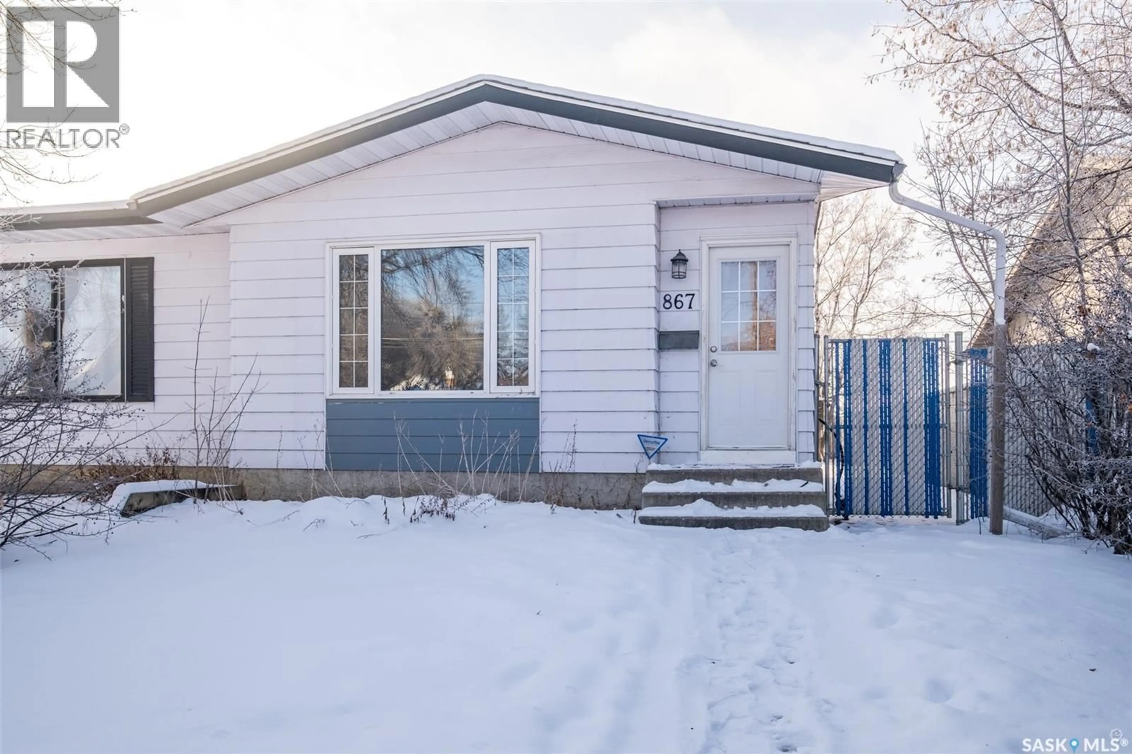 Home with vinyl exterior material, street for 867 7TH STREET, Prince Albert Saskatchewan S6V6T3