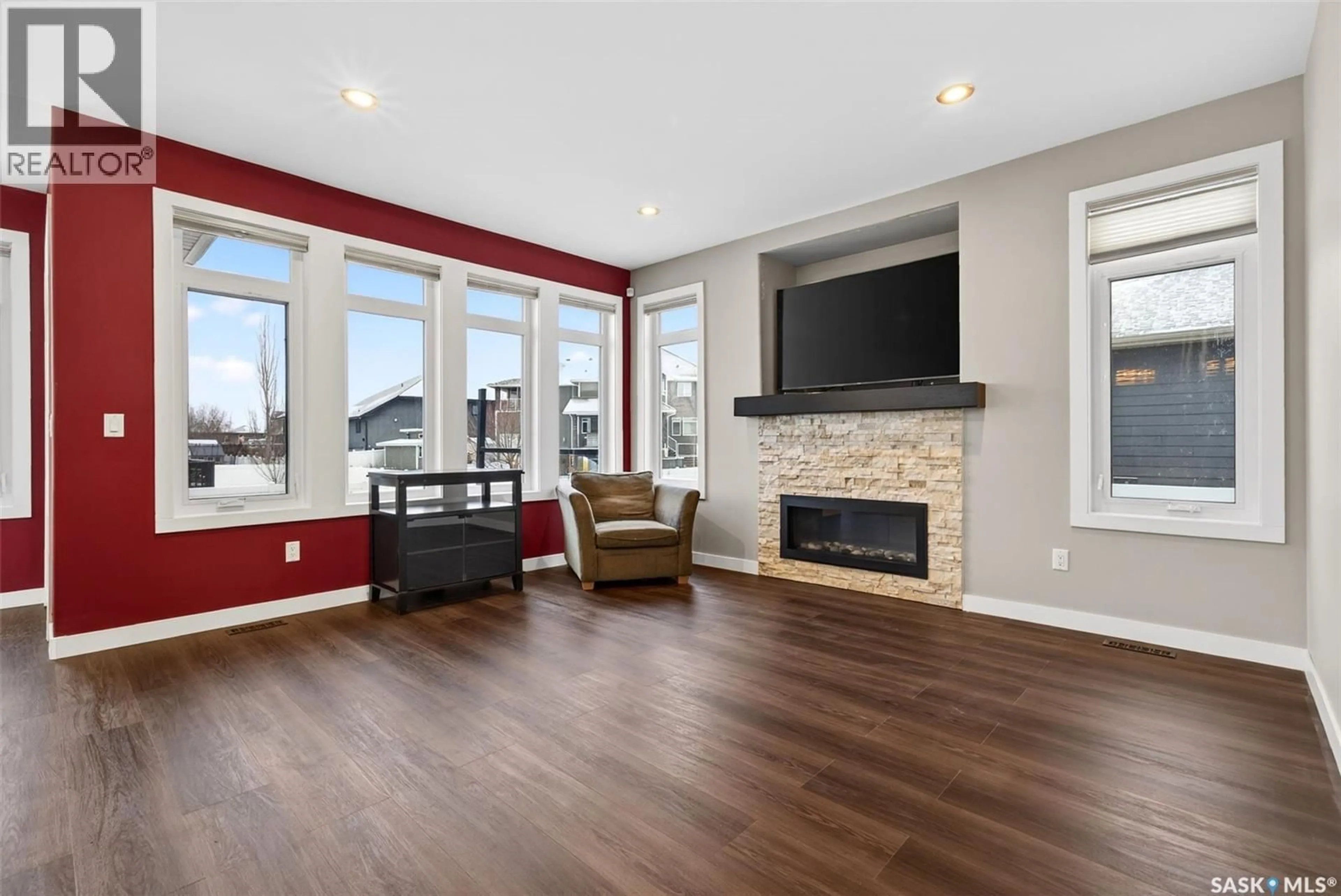 Living room with furniture, wood/laminate floor for 6112 KOEP AVENUE, Regina Saskatchewan S4X4E6