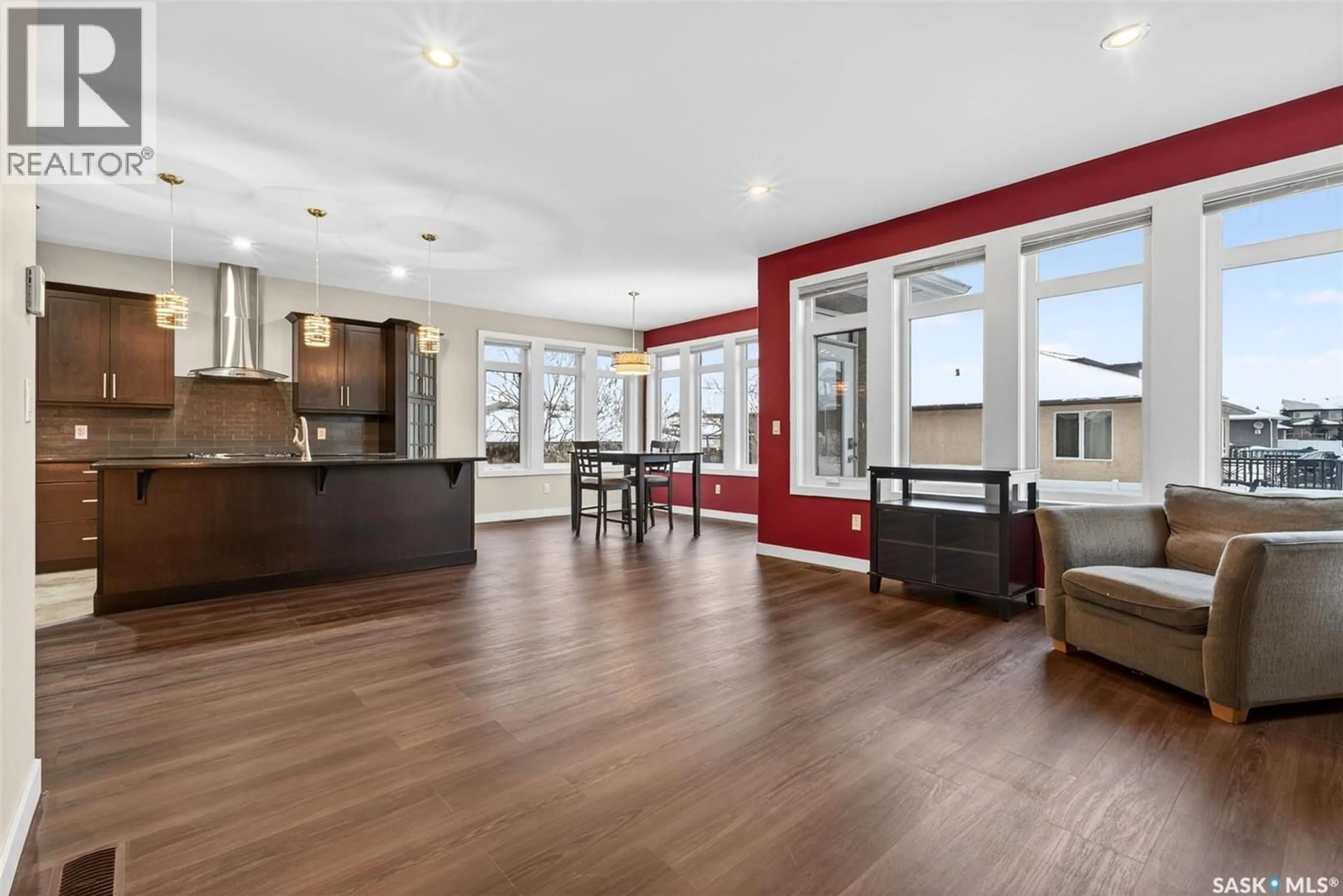 Open concept kitchen, wood/laminate floor for 6112 KOEP AVENUE, Regina Saskatchewan S4X4E6