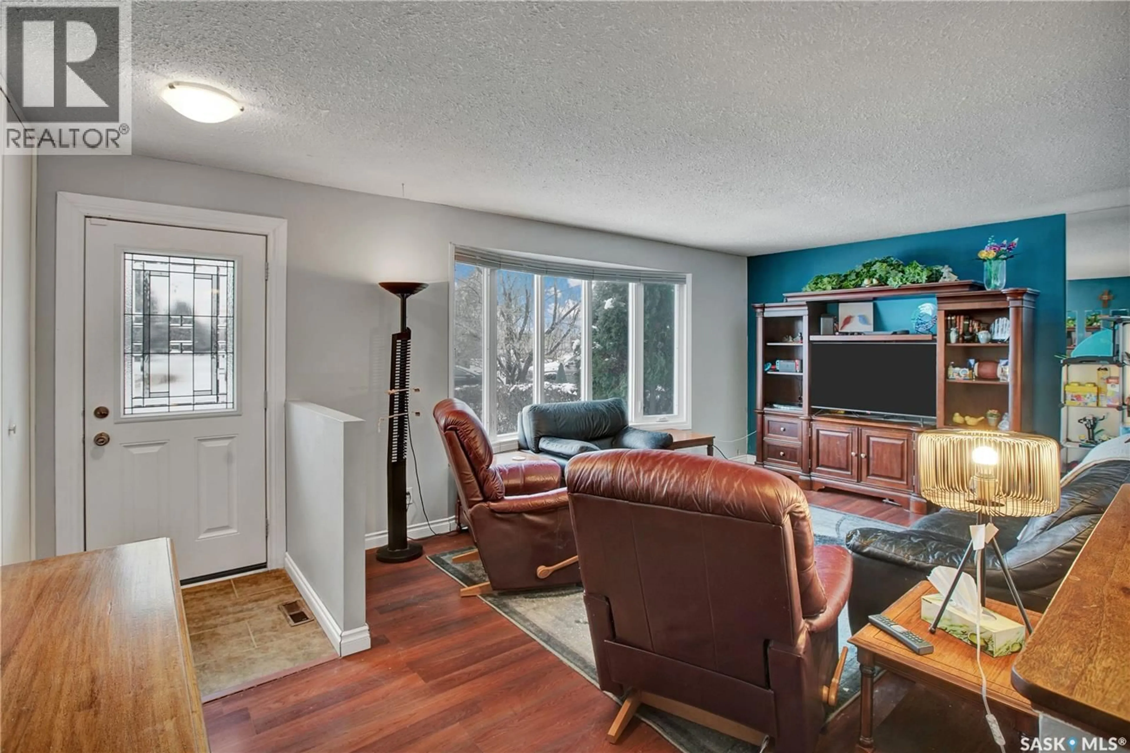 Living room with furniture, unknown for 97 MCGEE CRESCENT, Saskatoon Saskatchewan S7L4M6