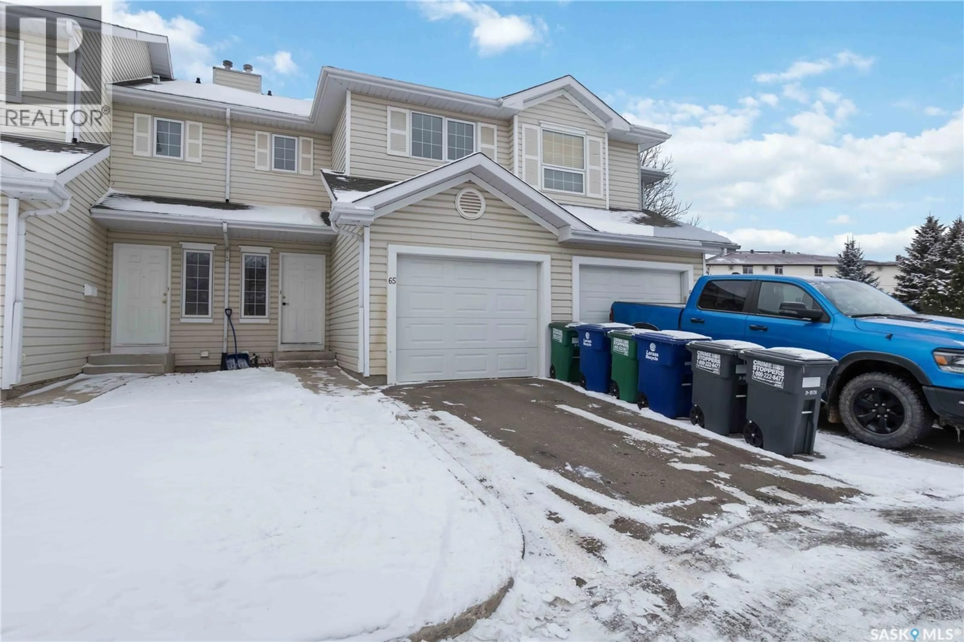 A pic from outside/outdoor area/front of a property/back of a property/a pic from drone, street for 65 110 KEEVIL CRESCENT, Saskatoon Saskatchewan S7N4N8