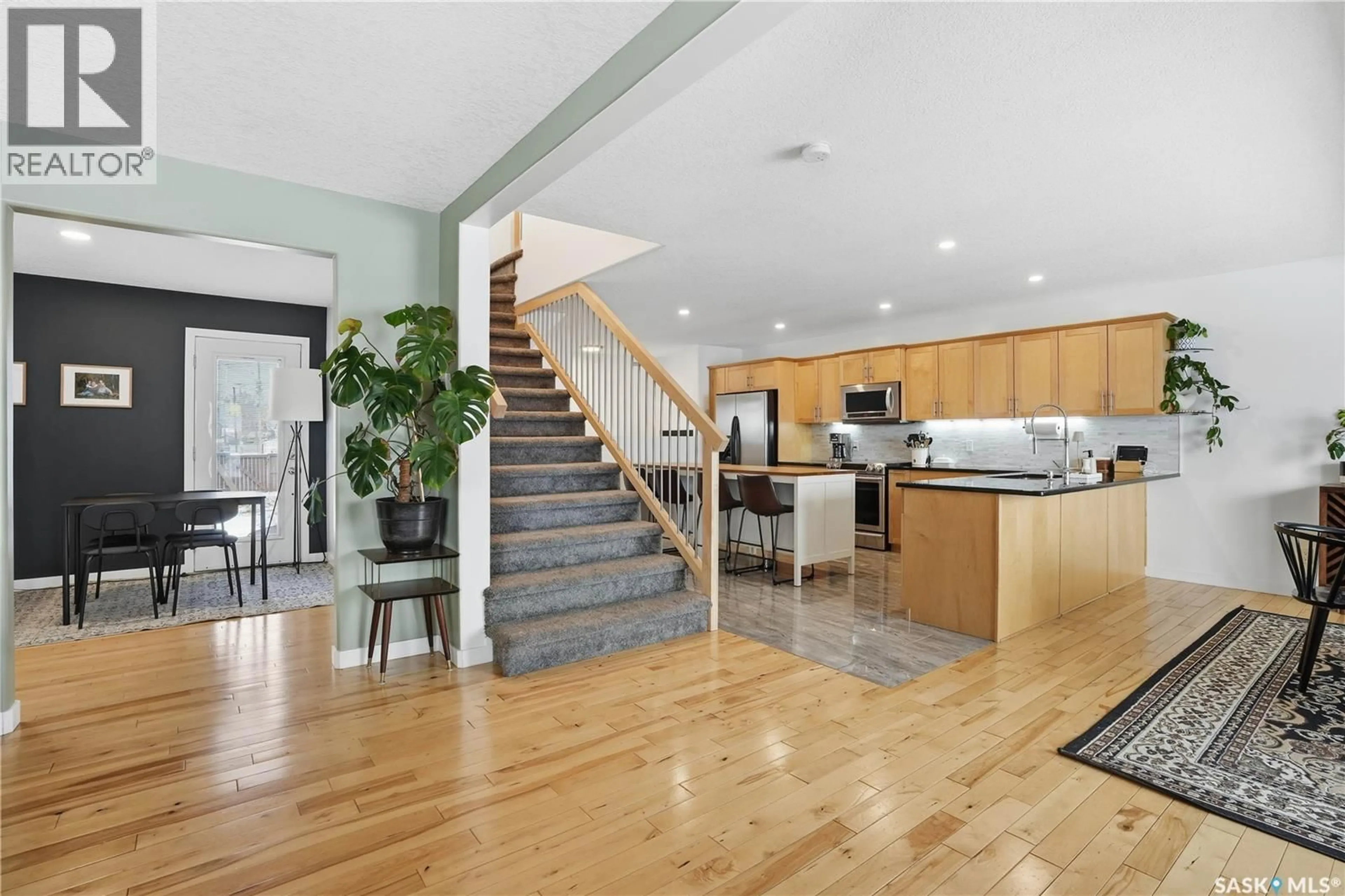 Open concept kitchen, wood/laminate floor for 116 NORTH FRONT STREET, Pense Saskatchewan S0G3W0