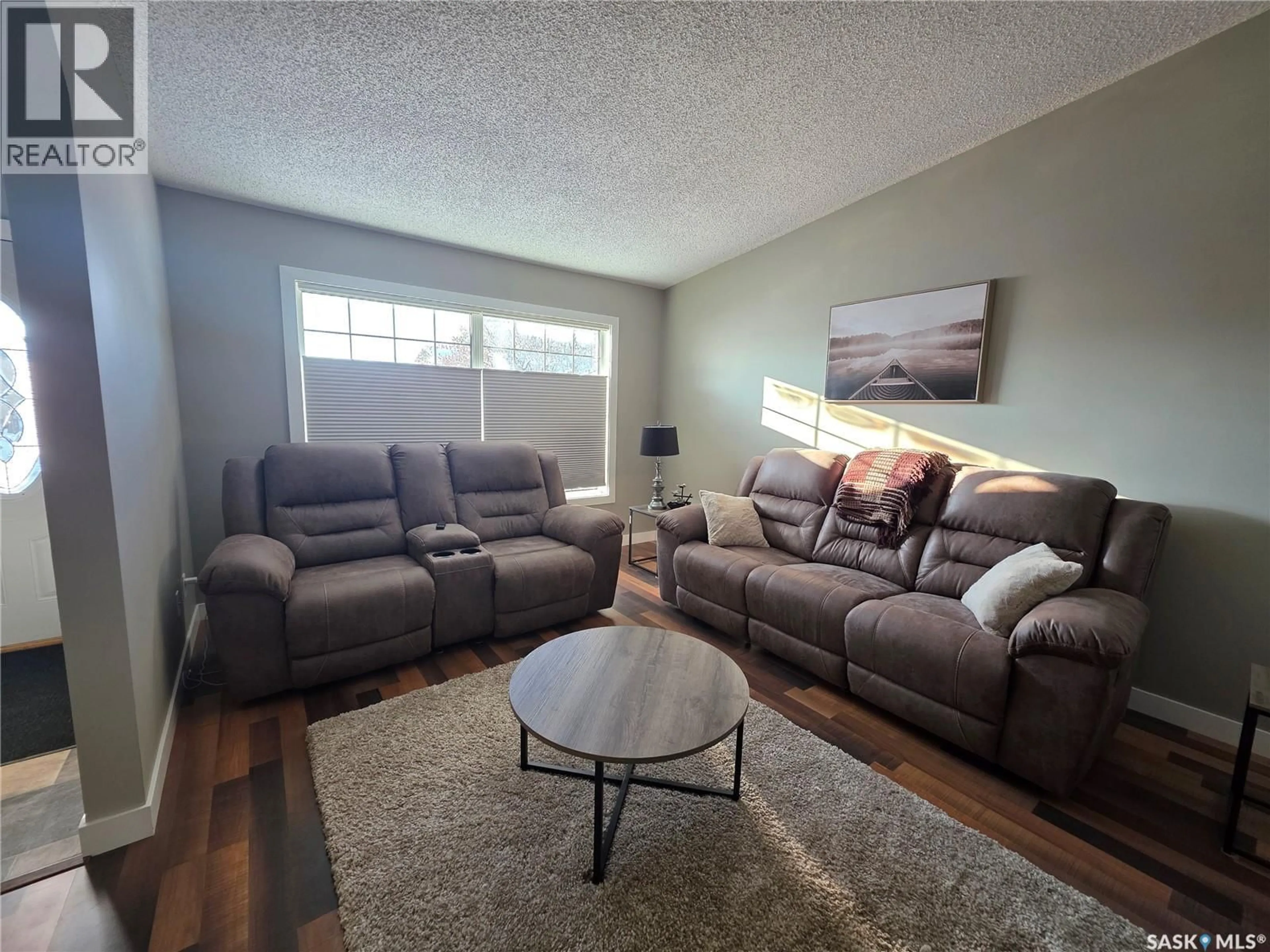 Living room with furniture, unknown for 503 MILNE CRESCENT, Estevan Saskatchewan S4A2K8