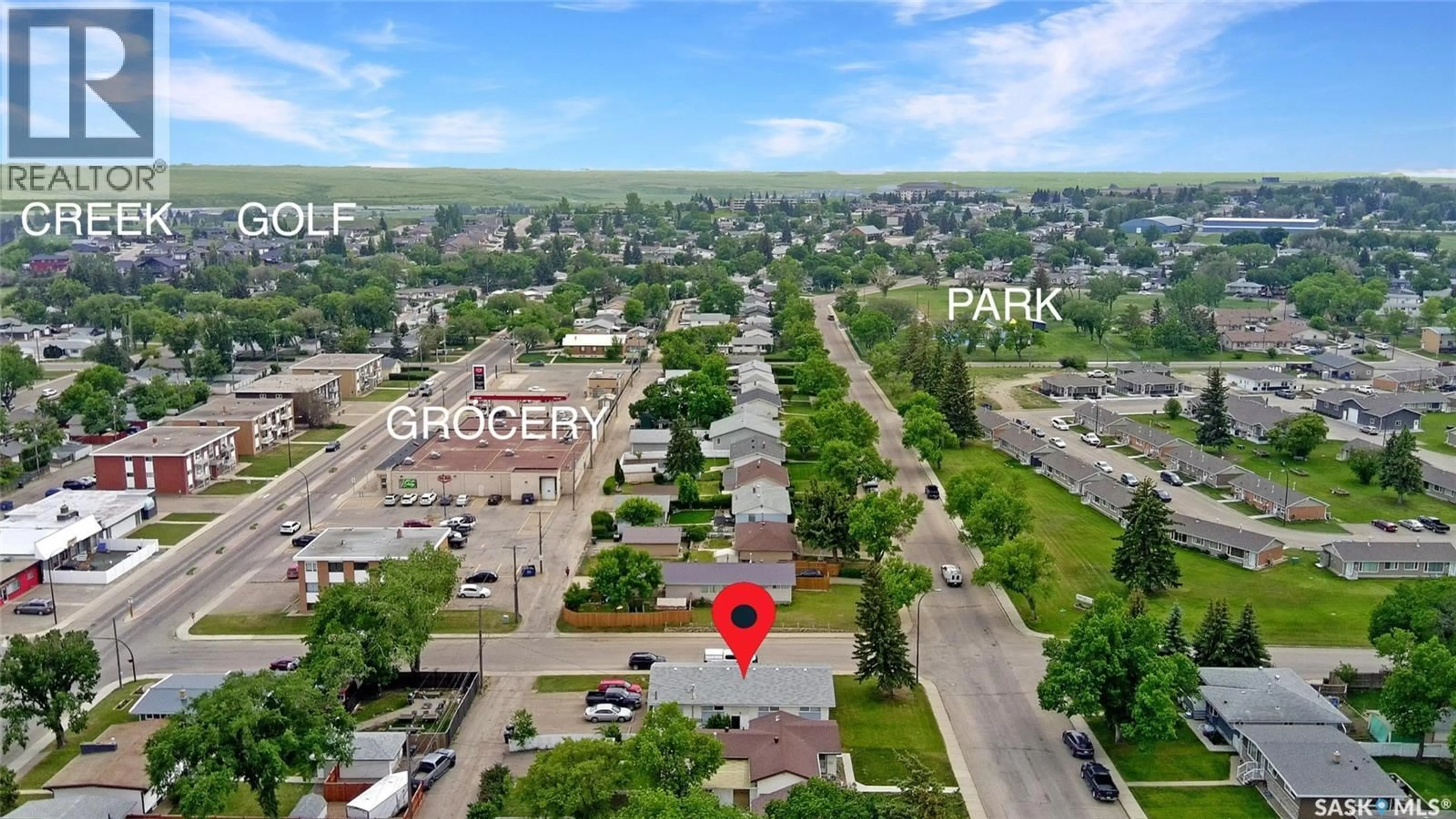 A pic from outside/outdoor area/front of a property/back of a property/a pic from drone, street for 275 CENTRAL AVENUE, Swift Current Saskatchewan S9H3G2