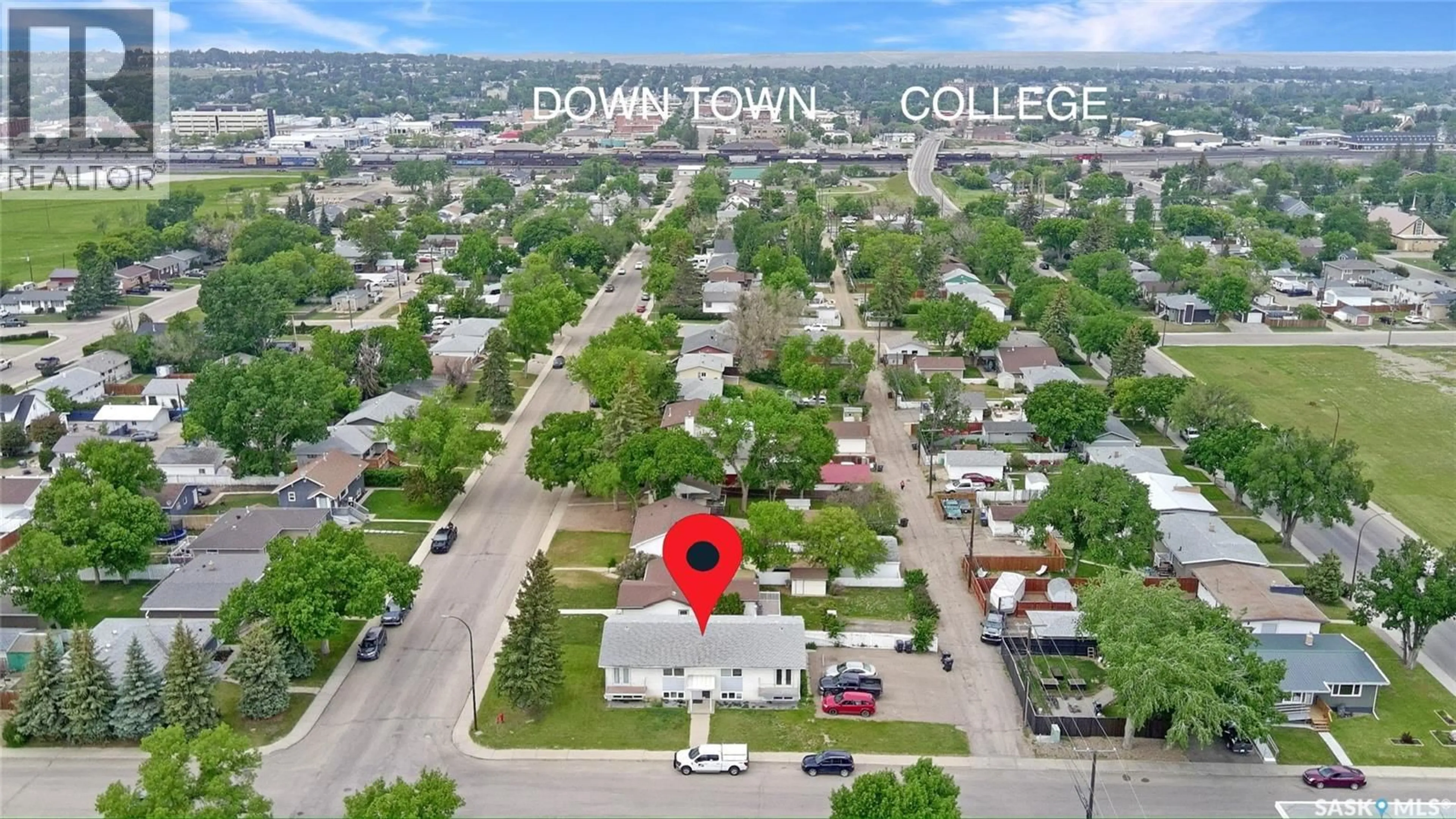 A pic from outside/outdoor area/front of a property/back of a property/a pic from drone, street for 275 CENTRAL AVENUE, Swift Current Saskatchewan S9H3G2