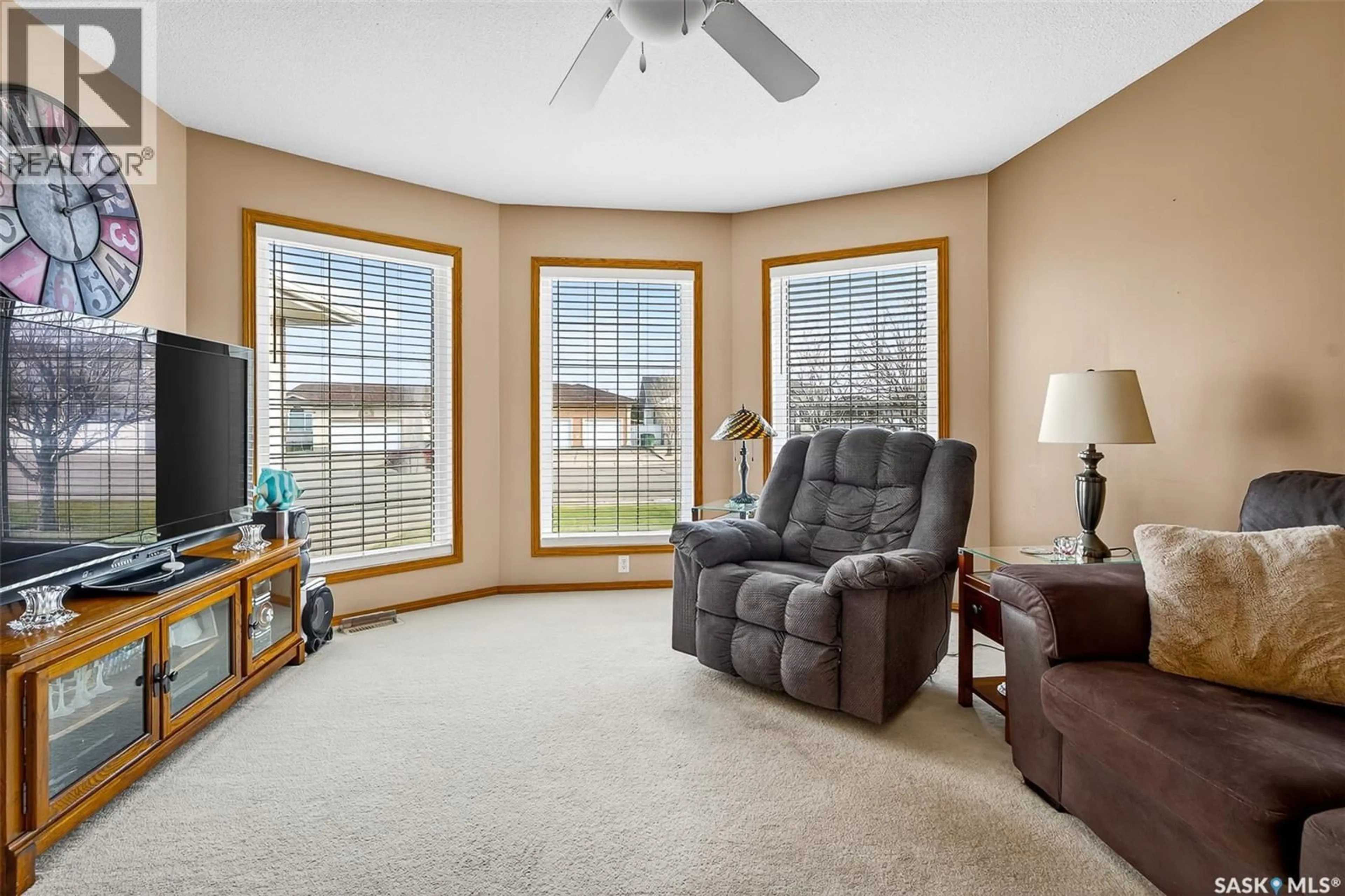 Living room with furniture, unknown for 413 WOODLILY DRIVE, Moose Jaw Saskatchewan S6J1K4